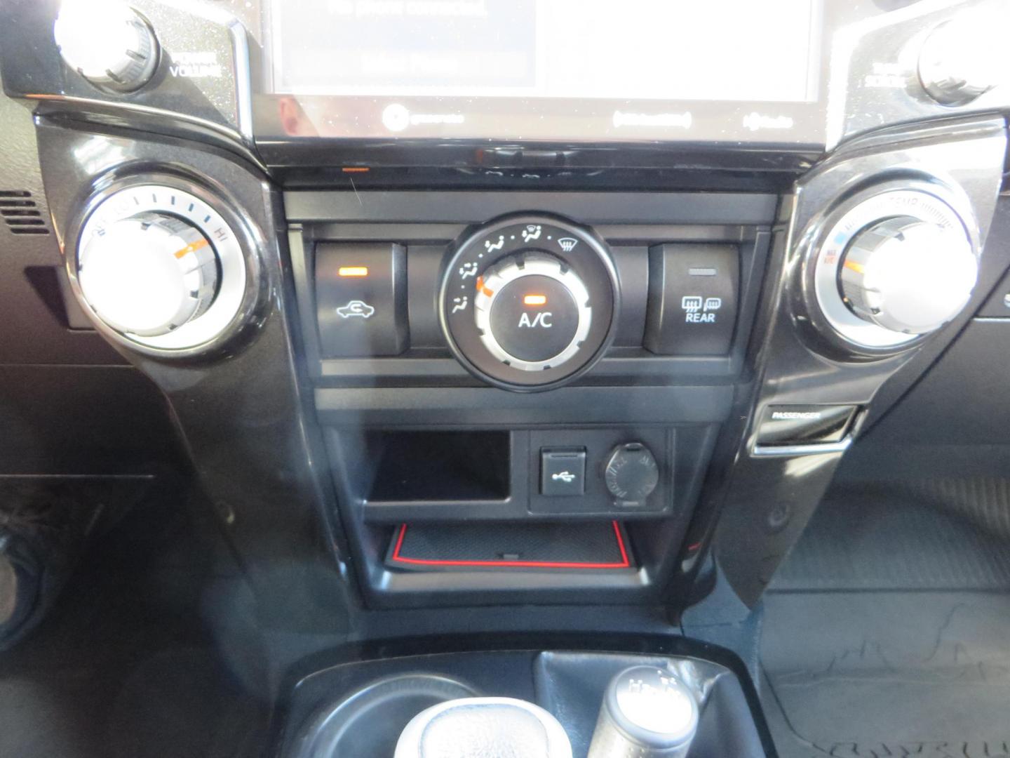 2021 White Toyota 4Runner TRD Off-road Premium 4WD (JTERU5JR5M5) with an 4.0L V6 DOHC 24V engine, 5A transmission, located at 2630 Grass Valley Highway, Auburn, CA, 95603, (530) 508-5100, 38.937893, -121.095482 - TRD Offroad Premium 4Runner ready for all of your adventures. Features Ironman suspension, 285 Falken Wildpeak AT3W tires, 17" Method Race wheels, Front winch bumper, Badlands winch, Led bumper and ditch lights, and rear cargo molle panels. - Photo#30