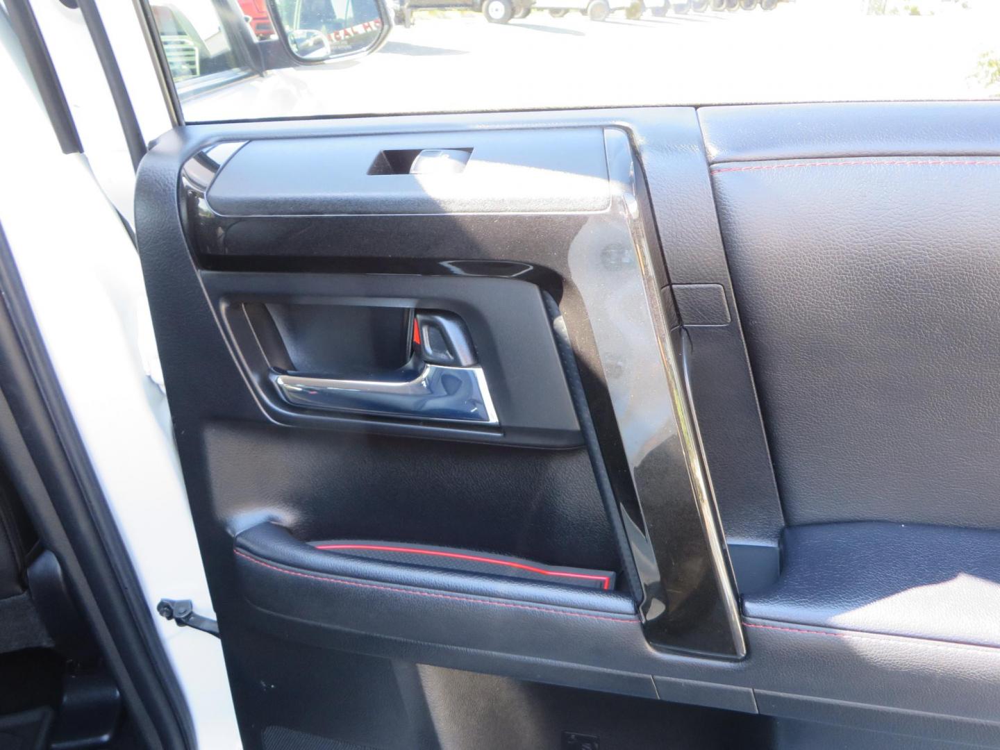 2021 White Toyota 4Runner TRD Off-road Premium 4WD (JTERU5JR5M5) with an 4.0L V6 DOHC 24V engine, 5A transmission, located at 2630 Grass Valley Highway, Auburn, CA, 95603, (530) 508-5100, 38.937893, -121.095482 - TRD Offroad Premium 4Runner ready for all of your adventures. Features Ironman suspension, 285 Falken Wildpeak AT3W tires, 17" Method Race wheels, Front winch bumper, Badlands winch, Led bumper and ditch lights, and rear cargo molle panels. - Photo#57