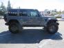 2021 Gray Jeep Wrangler Unlimited Rubicon (1C4HJXFN3MW) with an 2.0L L4 DOHC 16V TURBO engine, 6A transmission, located at 2630 Grass Valley Highway, Auburn, CA, 95603, (530) 508-5100, 38.937893, -121.095482 - Mopar lifted Rubicon, Fox shocks, 17" Method race wheels, 37" Nitto Recon Grappler tires, Falcon steering stabilizer, Smittybilt HD spare tire carrier, and Weathertech 1st and 2nd row floor liners. - Photo#5