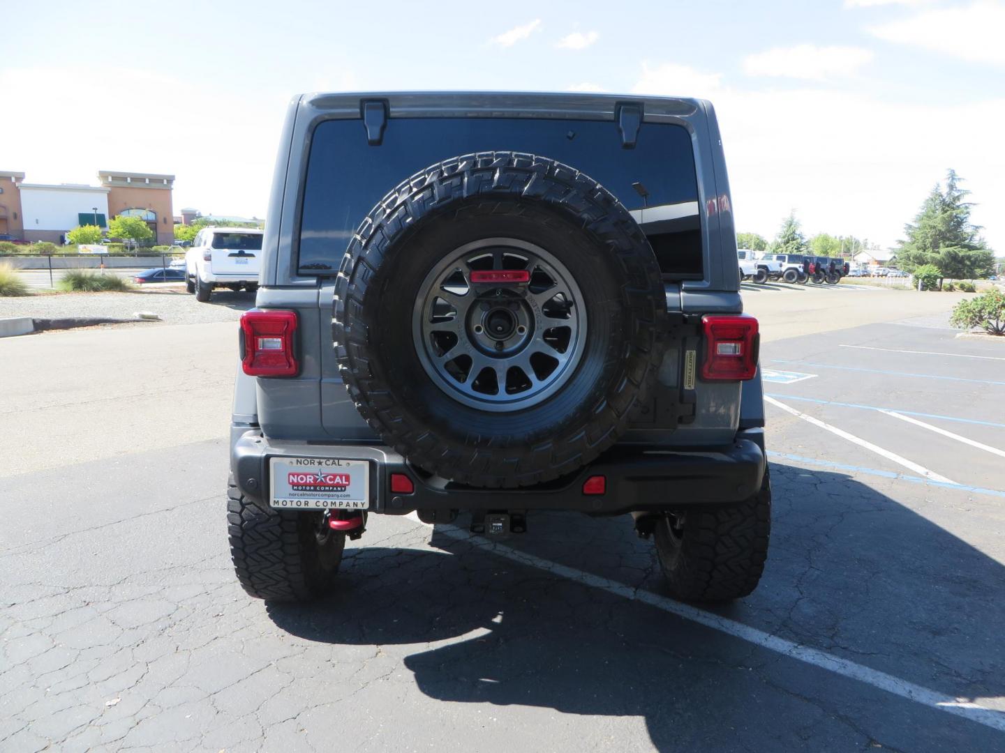 2021 Gray Jeep Wrangler Unlimited Rubicon (1C4HJXFN3MW) with an 2.0L L4 DOHC 16V TURBO engine, 6A transmission, located at 2630 Grass Valley Highway, Auburn, CA, 95603, (530) 508-5100, 38.937893, -121.095482 - Mopar lifted Rubicon, Fox shocks, 17" Method race wheels, 37" Nitto Recon Grappler tires, Falcon steering stabilizer, Smittybilt HD spare tire carrier, and Weathertech 1st and 2nd row floor liners. - Photo#3