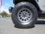 2021 Gray Jeep Wrangler Unlimited Rubicon (1C4HJXFN3MW) with an 2.0L L4 DOHC 16V TURBO engine, 6A transmission, located at 2630 Grass Valley Highway, Auburn, CA, 95603, (530) 508-5100, 38.937893, -121.095482 - Mopar lifted Rubicon, Fox shocks, 17" Method race wheels, 37" Nitto Recon Grappler tires, Falcon steering stabilizer, Smittybilt HD spare tire carrier, and Weathertech 1st and 2nd row floor liners. - Photo#8
