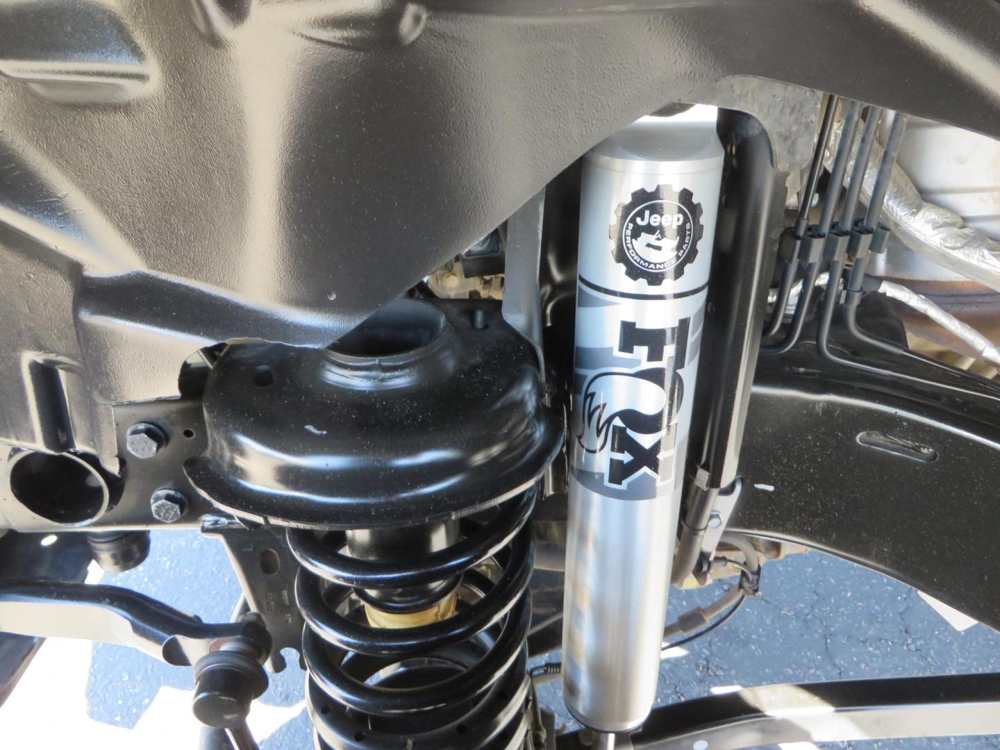 2021 Gray Jeep Wrangler Unlimited Rubicon (1C4HJXFN3MW) with an 2.0L L4 DOHC 16V TURBO engine, 6A transmission, located at 2630 Grass Valley Highway, Auburn, CA, 95603, (530) 508-5100, 38.937893, -121.095482 - Mopar lifted Rubicon, Fox shocks, 17" Method race wheels, 37" Nitto Recon Grappler tires, Falcon steering stabilizer, Smittybilt HD spare tire carrier, and Weathertech 1st and 2nd row floor liners. - Photo#10