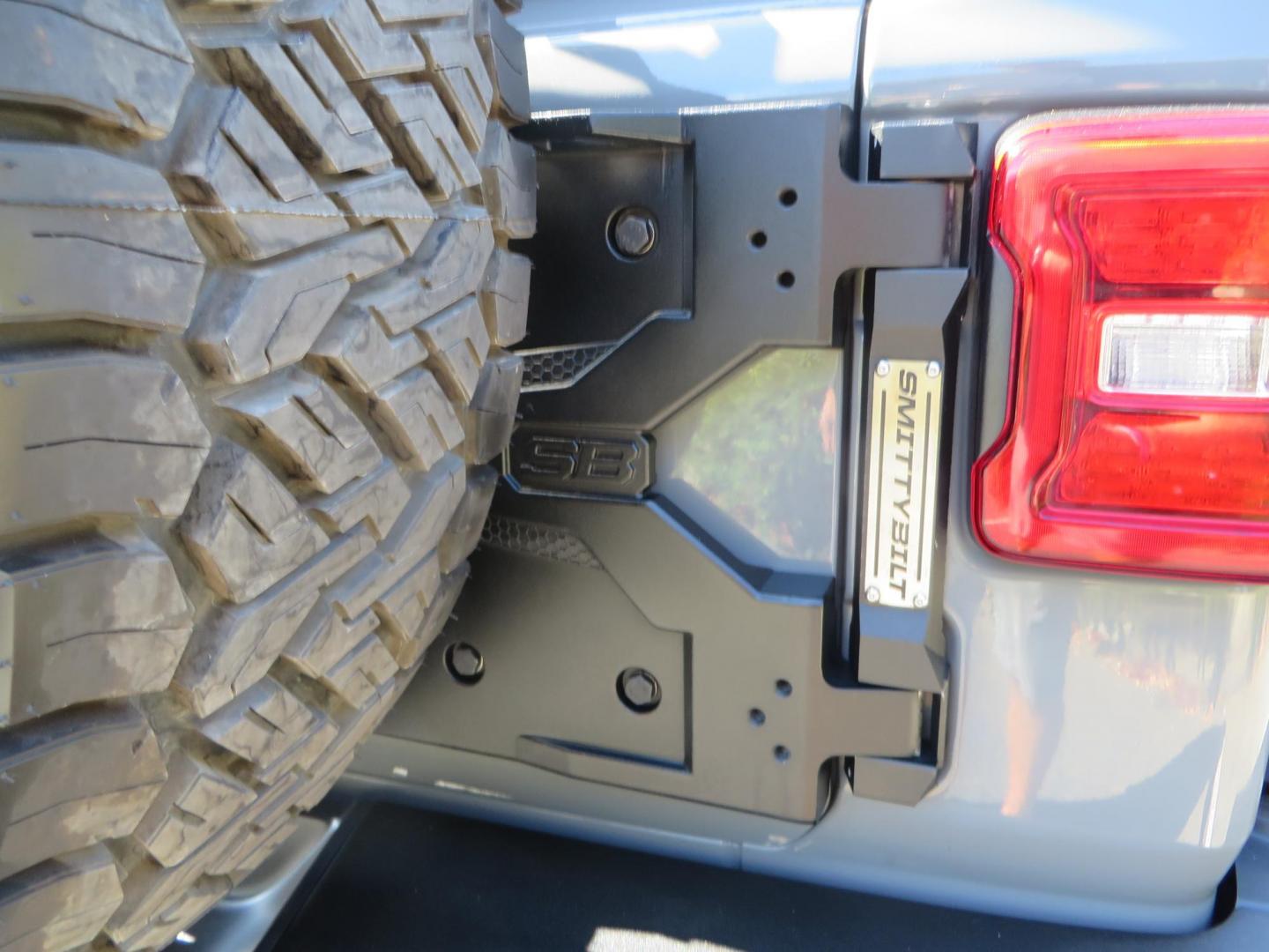 2021 Gray Jeep Wrangler Unlimited Rubicon (1C4HJXFN3MW) with an 2.0L L4 DOHC 16V TURBO engine, 6A transmission, located at 2630 Grass Valley Highway, Auburn, CA, 95603, (530) 508-5100, 38.937893, -121.095482 - Mopar lifted Rubicon, Fox shocks, 17" Method race wheels, 37" Nitto Recon Grappler tires, Falcon steering stabilizer, Smittybilt HD spare tire carrier, and Weathertech 1st and 2nd row floor liners. - Photo#14