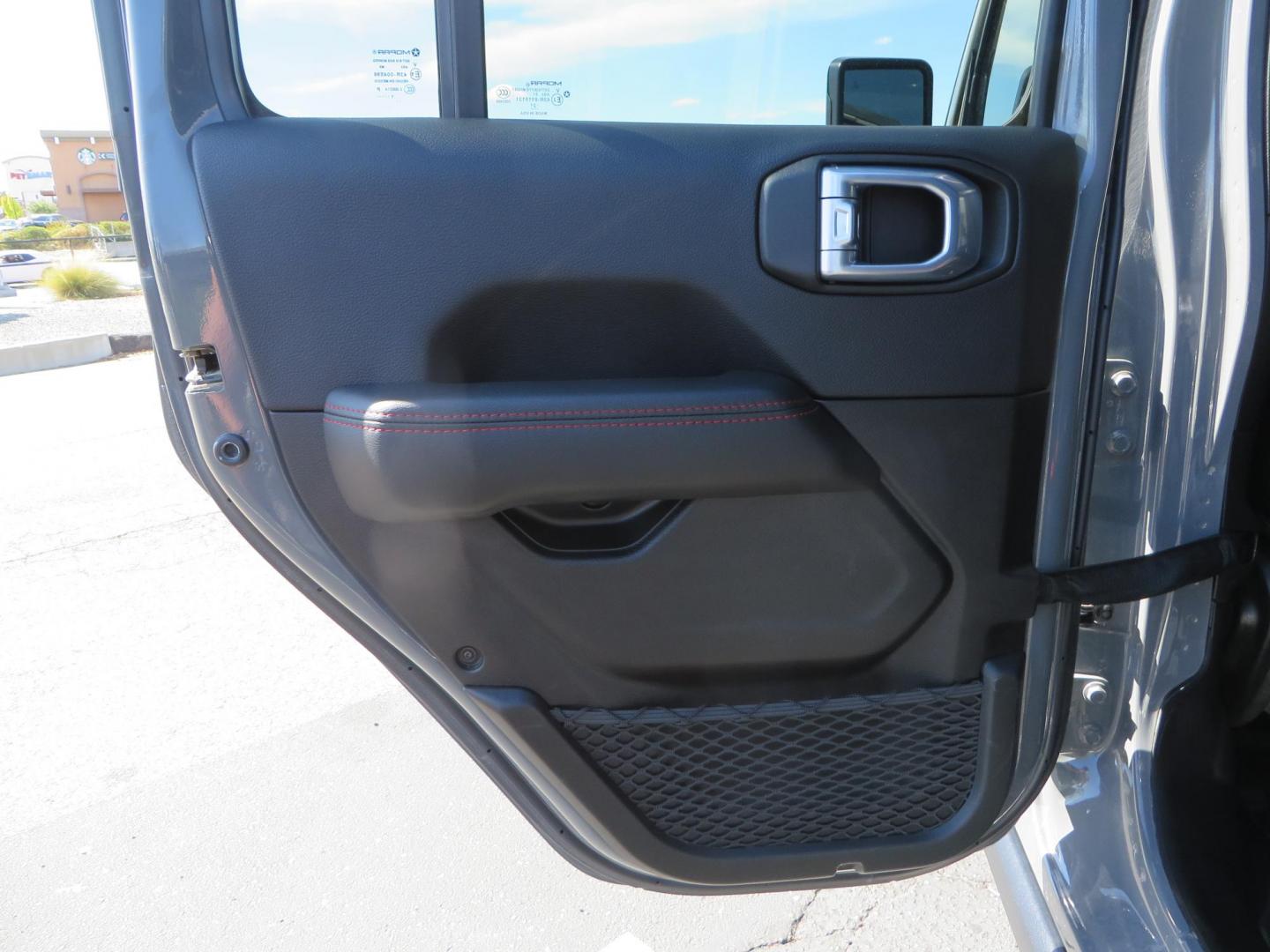 2021 Gray Jeep Wrangler Unlimited Rubicon (1C4HJXFN3MW) with an 2.0L L4 DOHC 16V TURBO engine, 6A transmission, located at 2630 Grass Valley Highway, Auburn, CA, 95603, (530) 508-5100, 38.937893, -121.095482 - Mopar lifted Rubicon, Fox shocks, 17" Method race wheels, 37" Nitto Recon Grappler tires, Falcon steering stabilizer, Smittybilt HD spare tire carrier, and Weathertech 1st and 2nd row floor liners. - Photo#43