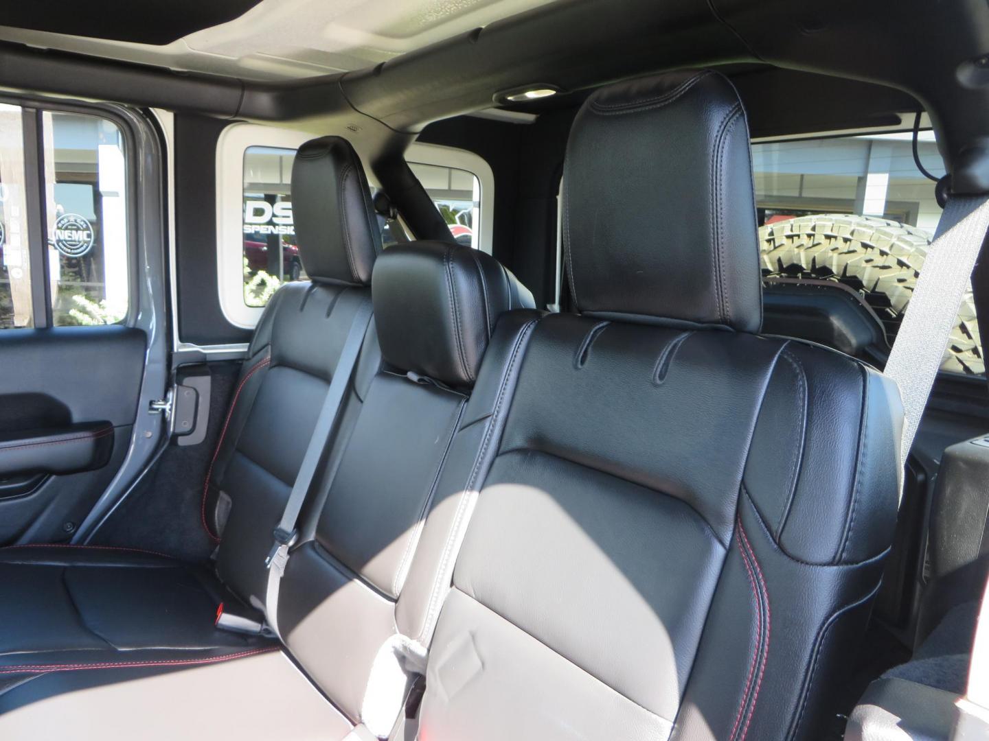 2021 Gray Jeep Wrangler Unlimited Rubicon (1C4HJXFN3MW) with an 2.0L L4 DOHC 16V TURBO engine, 6A transmission, located at 2630 Grass Valley Highway, Auburn, CA, 95603, (530) 508-5100, 38.937893, -121.095482 - Mopar lifted Rubicon, Fox shocks, 17" Method race wheels, 37" Nitto Recon Grappler tires, Falcon steering stabilizer, Smittybilt HD spare tire carrier, and Weathertech 1st and 2nd row floor liners. - Photo#45