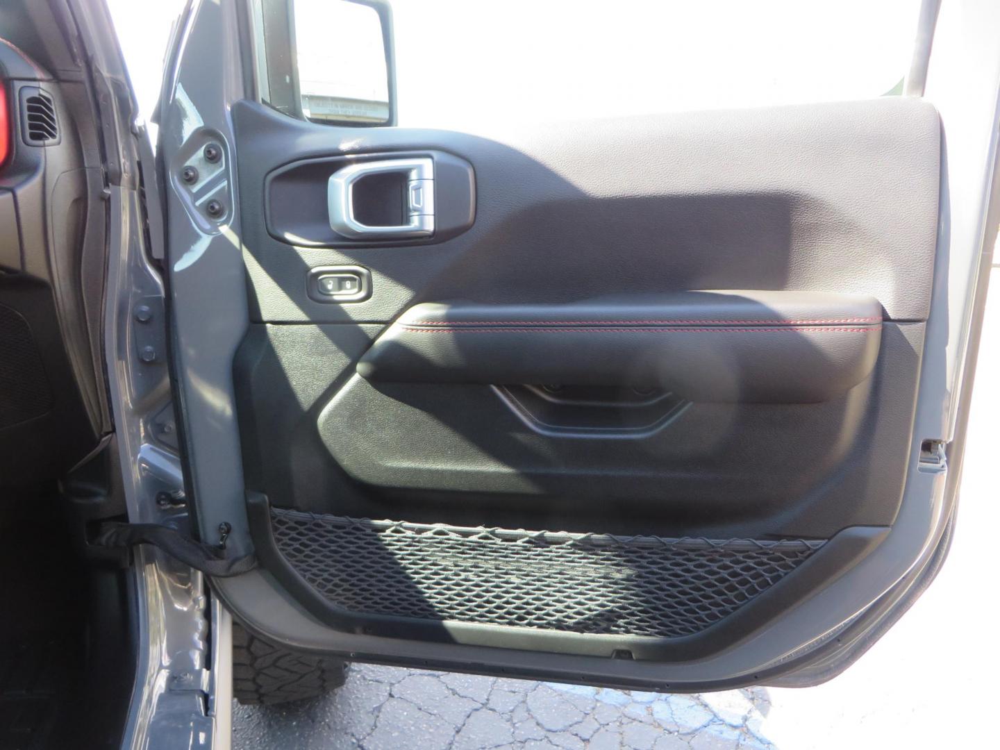 2021 Gray Jeep Wrangler Unlimited Rubicon (1C4HJXFN3MW) with an 2.0L L4 DOHC 16V TURBO engine, 6A transmission, located at 2630 Grass Valley Highway, Auburn, CA, 95603, (530) 508-5100, 38.937893, -121.095482 - Mopar lifted Rubicon, Fox shocks, 17" Method race wheels, 37" Nitto Recon Grappler tires, Falcon steering stabilizer, Smittybilt HD spare tire carrier, and Weathertech 1st and 2nd row floor liners. - Photo#52
