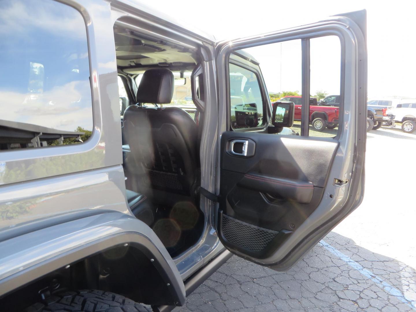 2021 Gray Jeep Wrangler Unlimited Rubicon (1C4HJXFN3MW) with an 2.0L L4 DOHC 16V TURBO engine, 6A transmission, located at 2630 Grass Valley Highway, Auburn, CA, 95603, (530) 508-5100, 38.937893, -121.095482 - Mopar lifted Rubicon, Fox shocks, 17" Method race wheels, 37" Nitto Recon Grappler tires, Falcon steering stabilizer, Smittybilt HD spare tire carrier, and Weathertech 1st and 2nd row floor liners. - Photo#57