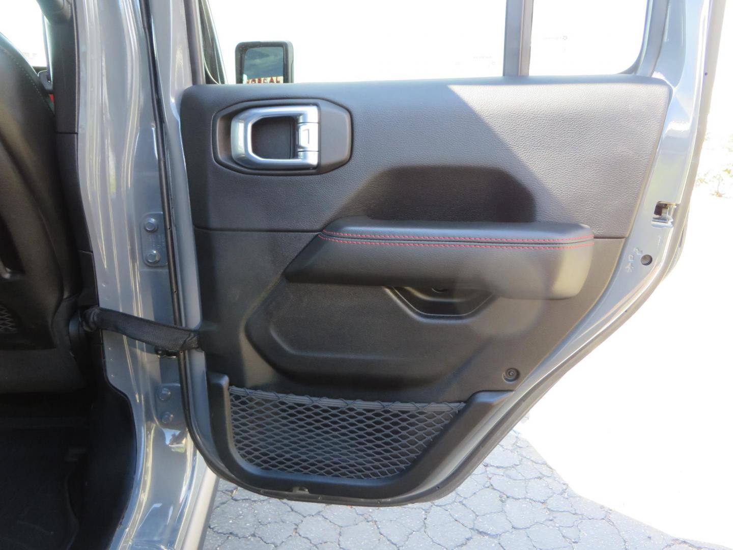 2021 Gray Jeep Wrangler Unlimited Rubicon (1C4HJXFN3MW) with an 2.0L L4 DOHC 16V TURBO engine, 6A transmission, located at 2630 Grass Valley Highway, Auburn, CA, 95603, (530) 508-5100, 38.937893, -121.095482 - Mopar lifted Rubicon, Fox shocks, 17" Method race wheels, 37" Nitto Recon Grappler tires, Falcon steering stabilizer, Smittybilt HD spare tire carrier, and Weathertech 1st and 2nd row floor liners. - Photo#58