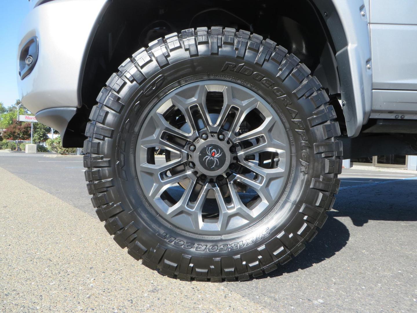 2022 SILVER /Black RAM 2500 Big Horn Black Widow Edition Crew Cab 4WD (3C6UR5DL3NG) with an 6.7L L6 OHV 24V TURBO DIESEL engine, 6A transmission, located at 2630 Grass Valley Highway, Auburn, CA, 95603, (530) 508-5100, 38.937893, -121.095482 - Ram 2500 Black Widow Edition Features 5" Suspension Lift System 20" Black Off Road Wheels 37" BFG KM3 Mud Terrain Tires Color Matched Pocket Fender Flares AMP Power Running Boards Tinted Front Windows Black Widow Gauge Cluster Black Widow Custom Stitched Headrests Red LED Interior Lights P - Photo#8