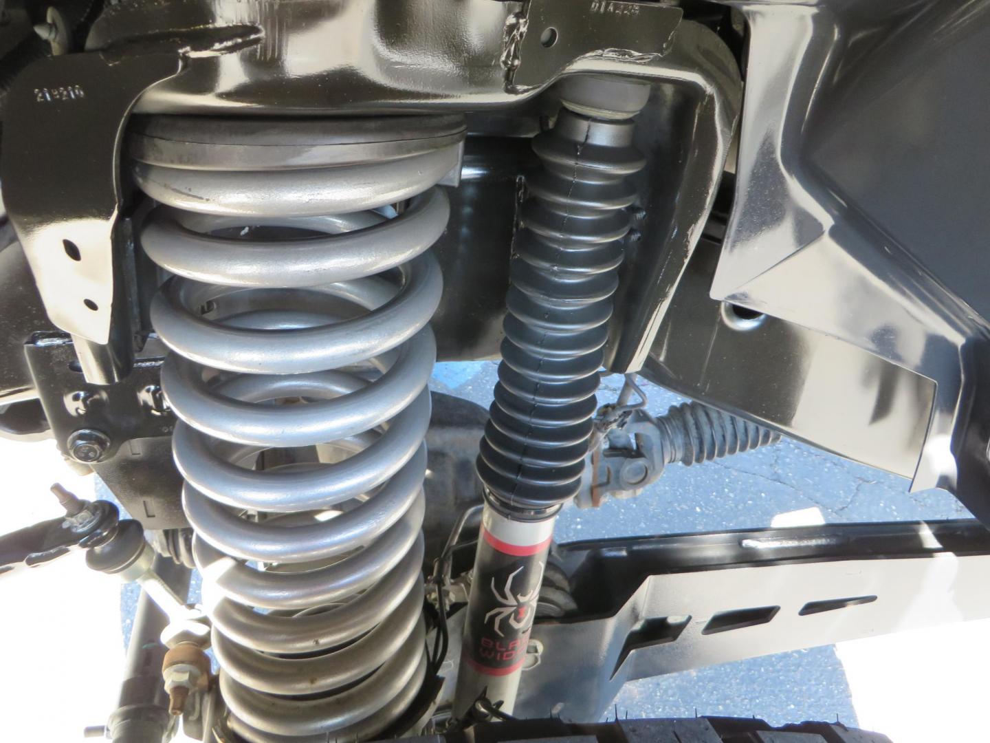 2022 SILVER /Black RAM 2500 Big Horn Black Widow Edition Crew Cab 4WD (3C6UR5DL3NG) with an 6.7L L6 OHV 24V TURBO DIESEL engine, 6A transmission, located at 2630 Grass Valley Highway, Auburn, CA, 95603, (530) 508-5100, 38.937893, -121.095482 - Ram 2500 Black Widow Edition Features 5" Suspension Lift System 20" Black Off Road Wheels 37" BFG KM3 Mud Terrain Tires Color Matched Pocket Fender Flares AMP Power Running Boards Tinted Front Windows Black Widow Gauge Cluster Black Widow Custom Stitched Headrests Red LED Interior Lights P - Photo#10