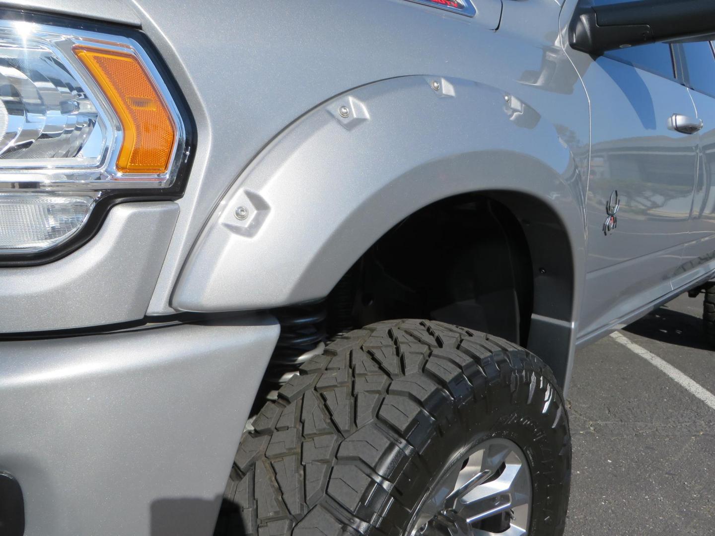 2022 SILVER /Black RAM 2500 Big Horn Black Widow Edition Crew Cab 4WD (3C6UR5DL3NG) with an 6.7L L6 OHV 24V TURBO DIESEL engine, 6A transmission, located at 2630 Grass Valley Highway, Auburn, CA, 95603, (530) 508-5100, 38.937893, -121.095482 - Ram 2500 Black Widow Edition Features 5" Suspension Lift System 20" Black Off Road Wheels 37" BFG KM3 Mud Terrain Tires Color Matched Pocket Fender Flares AMP Power Running Boards Tinted Front Windows Black Widow Gauge Cluster Black Widow Custom Stitched Headrests Red LED Interior Lights P - Photo#12