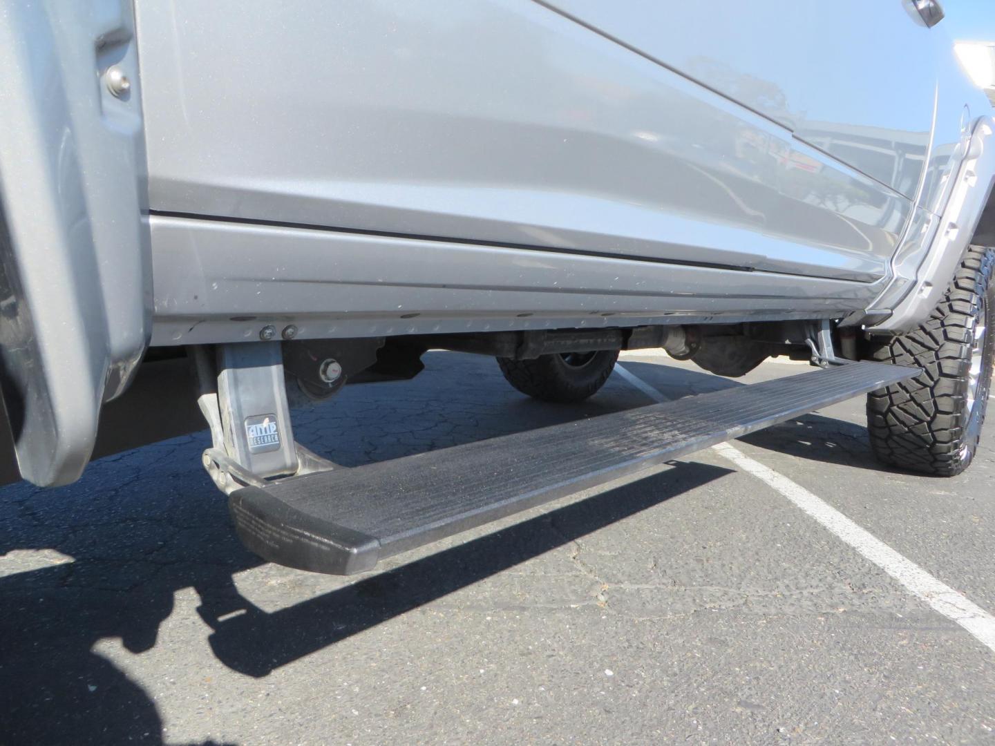 2022 SILVER /Black RAM 2500 Big Horn Black Widow Edition Crew Cab 4WD (3C6UR5DL3NG) with an 6.7L L6 OHV 24V TURBO DIESEL engine, 6A transmission, located at 2630 Grass Valley Highway, Auburn, CA, 95603, (530) 508-5100, 38.937893, -121.095482 - Ram 2500 Black Widow Edition Features 5" Suspension Lift System 20" Black Off Road Wheels 37" BFG KM3 Mud Terrain Tires Color Matched Pocket Fender Flares AMP Power Running Boards Tinted Front Windows Black Widow Gauge Cluster Black Widow Custom Stitched Headrests Red LED Interior Lights P - Photo#19