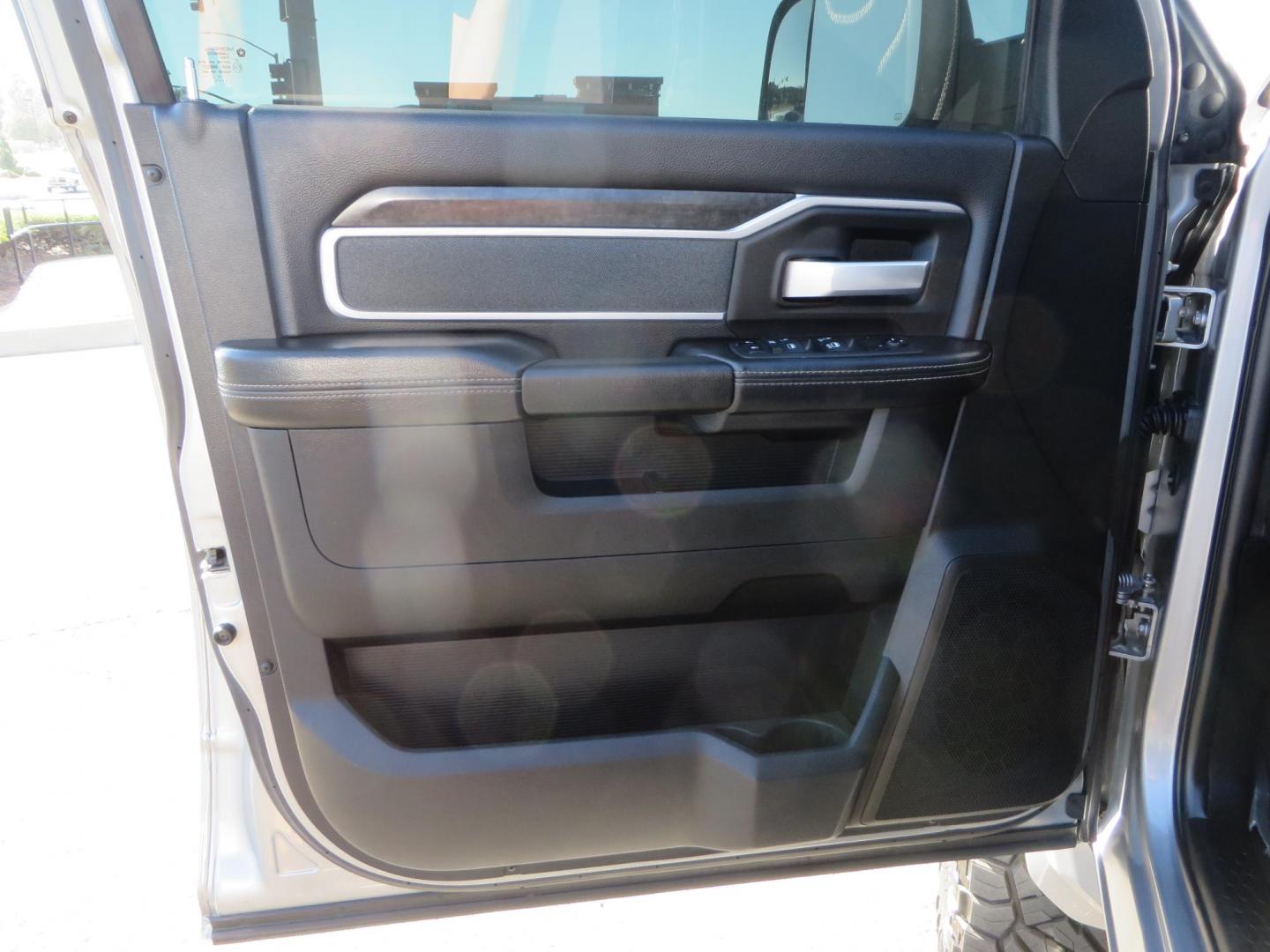 2022 SILVER /Black RAM 2500 Big Horn Black Widow Edition Crew Cab 4WD (3C6UR5DL3NG) with an 6.7L L6 OHV 24V TURBO DIESEL engine, 6A transmission, located at 2630 Grass Valley Highway, Auburn, CA, 95603, (530) 508-5100, 38.937893, -121.095482 - Ram 2500 Black Widow Edition Features 5" Suspension Lift System 20" Black Off Road Wheels 37" BFG KM3 Mud Terrain Tires Color Matched Pocket Fender Flares AMP Power Running Boards Tinted Front Windows Black Widow Gauge Cluster Black Widow Custom Stitched Headrests Red LED Interior Lights P - Photo#21