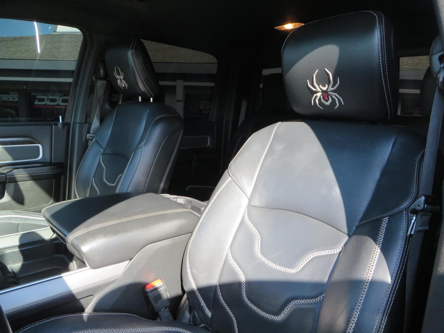 2022 SILVER /Black RAM 2500 Big Horn Black Widow Edition Crew Cab 4WD (3C6UR5DL3NG) with an 6.7L L6 OHV 24V TURBO DIESEL engine, 6A transmission, located at 2630 Grass Valley Highway, Auburn, CA, 95603, (530) 508-5100, 38.937893, -121.095482 - Ram 2500 Black Widow Edition Features 5" Suspension Lift System 20" Black Off Road Wheels 37" BFG KM3 Mud Terrain Tires Color Matched Pocket Fender Flares AMP Power Running Boards Tinted Front Windows Black Widow Gauge Cluster Black Widow Custom Stitched Headrests Red LED Interior Lights P - Photo#24