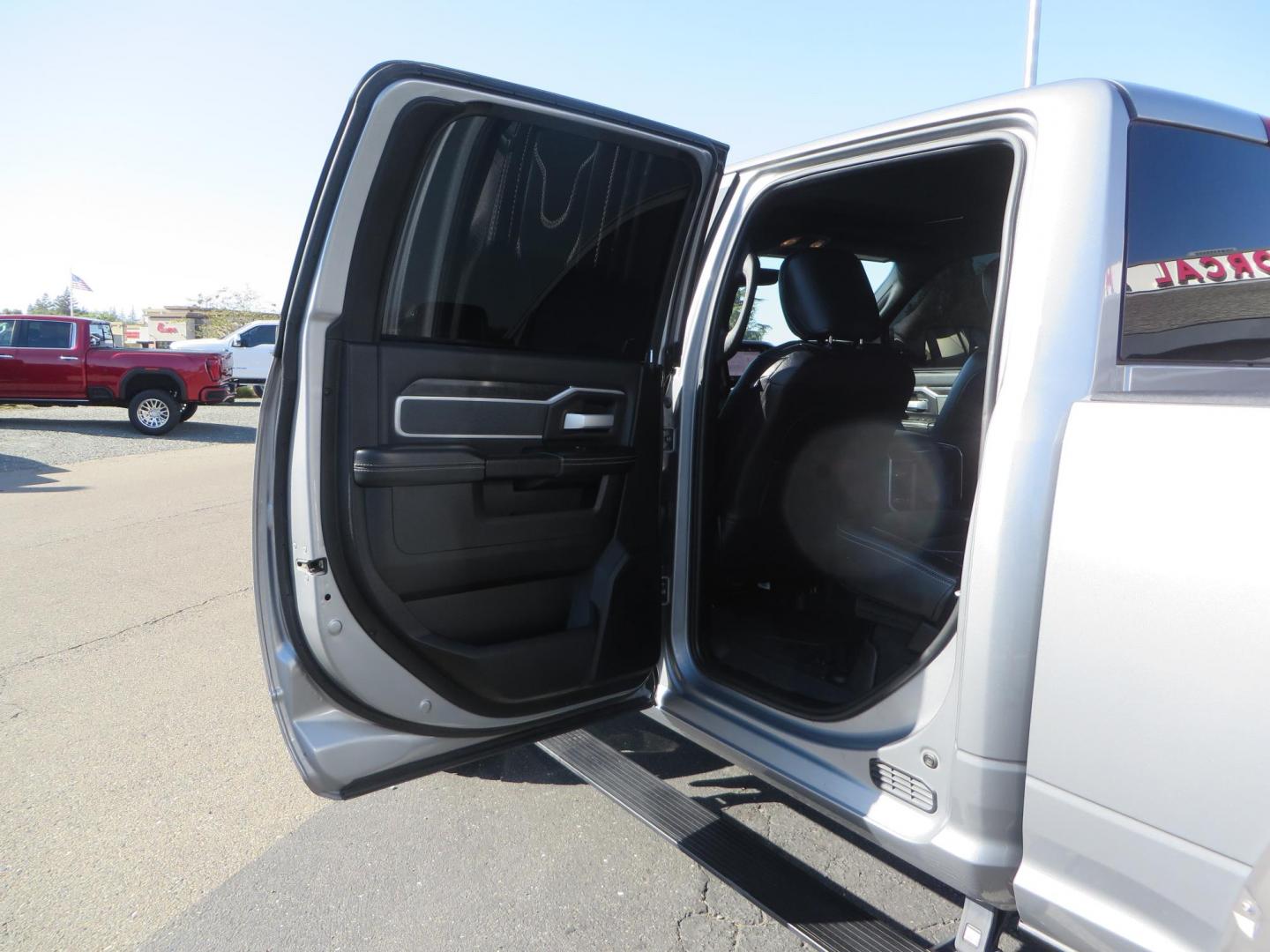 2022 SILVER /Black RAM 2500 Big Horn Black Widow Edition Crew Cab 4WD (3C6UR5DL3NG) with an 6.7L L6 OHV 24V TURBO DIESEL engine, 6A transmission, located at 2630 Grass Valley Highway, Auburn, CA, 95603, (530) 508-5100, 38.937893, -121.095482 - Ram 2500 Black Widow Edition Features 5" Suspension Lift System 20" Black Off Road Wheels 37" BFG KM3 Mud Terrain Tires Color Matched Pocket Fender Flares AMP Power Running Boards Tinted Front Windows Black Widow Gauge Cluster Black Widow Custom Stitched Headrests Red LED Interior Lights P - Photo#43