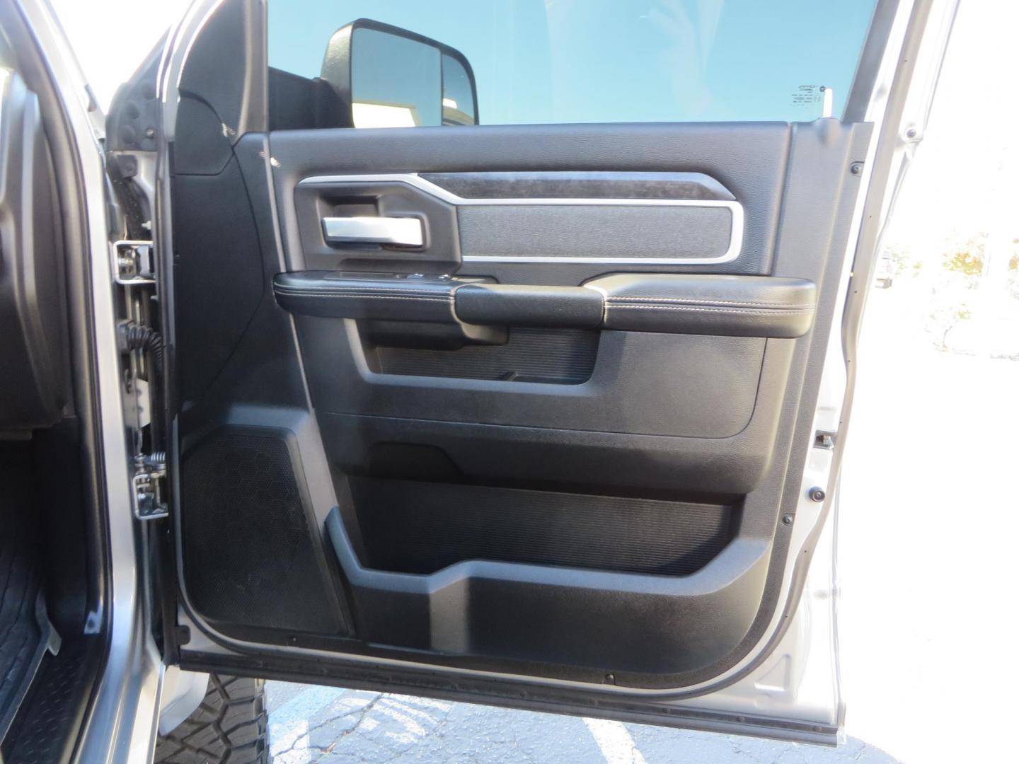 2022 SILVER /Black RAM 2500 Big Horn Black Widow Edition Crew Cab 4WD (3C6UR5DL3NG) with an 6.7L L6 OHV 24V TURBO DIESEL engine, 6A transmission, located at 2630 Grass Valley Highway, Auburn, CA, 95603, (530) 508-5100, 38.937893, -121.095482 - Ram 2500 Black Widow Edition Features 5" Suspension Lift System 20" Black Off Road Wheels 37" BFG KM3 Mud Terrain Tires Color Matched Pocket Fender Flares AMP Power Running Boards Tinted Front Windows Black Widow Gauge Cluster Black Widow Custom Stitched Headrests Red LED Interior Lights P - Photo#52