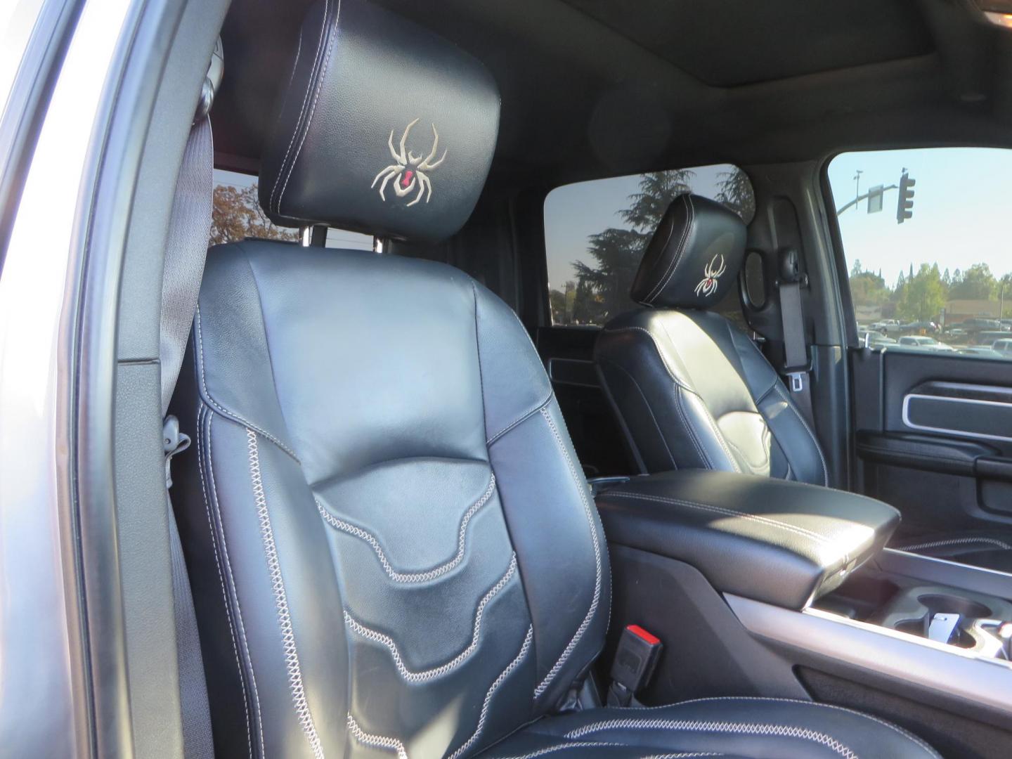 2022 SILVER /Black RAM 2500 Big Horn Black Widow Edition Crew Cab 4WD (3C6UR5DL3NG) with an 6.7L L6 OHV 24V TURBO DIESEL engine, 6A transmission, located at 2630 Grass Valley Highway, Auburn, CA, 95603, (530) 508-5100, 38.937893, -121.095482 - Ram 2500 Black Widow Edition Features 5" Suspension Lift System 20" Black Off Road Wheels 37" BFG KM3 Mud Terrain Tires Color Matched Pocket Fender Flares AMP Power Running Boards Tinted Front Windows Black Widow Gauge Cluster Black Widow Custom Stitched Headrests Red LED Interior Lights P - Photo#55