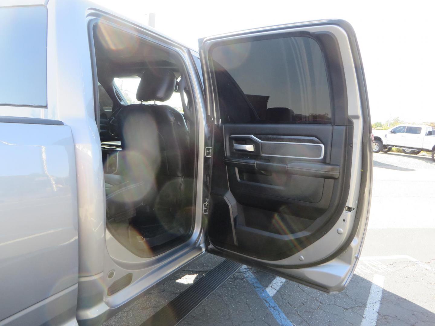 2022 SILVER /Black RAM 2500 Big Horn Black Widow Edition Crew Cab 4WD (3C6UR5DL3NG) with an 6.7L L6 OHV 24V TURBO DIESEL engine, 6A transmission, located at 2630 Grass Valley Highway, Auburn, CA, 95603, (530) 508-5100, 38.937893, -121.095482 - Ram 2500 Black Widow Edition Features 5" Suspension Lift System 20" Black Off Road Wheels 37" BFG KM3 Mud Terrain Tires Color Matched Pocket Fender Flares AMP Power Running Boards Tinted Front Windows Black Widow Gauge Cluster Black Widow Custom Stitched Headrests Red LED Interior Lights P - Photo#58