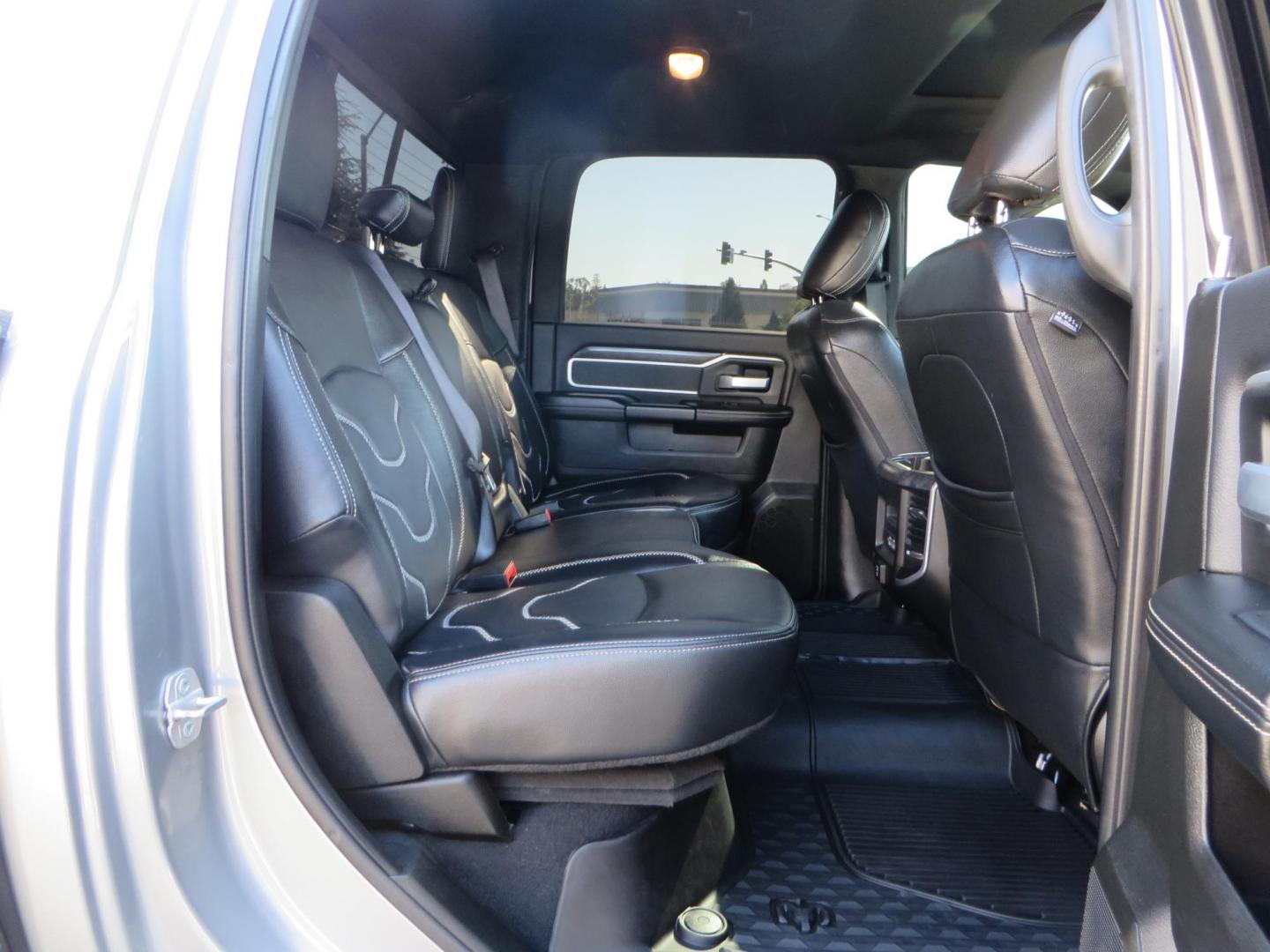 2022 SILVER /Black RAM 2500 Big Horn Black Widow Edition Crew Cab 4WD (3C6UR5DL3NG) with an 6.7L L6 OHV 24V TURBO DIESEL engine, 6A transmission, located at 2630 Grass Valley Highway, Auburn, CA, 95603, (530) 508-5100, 38.937893, -121.095482 - Ram 2500 Black Widow Edition Features 5" Suspension Lift System 20" Black Off Road Wheels 37" BFG KM3 Mud Terrain Tires Color Matched Pocket Fender Flares AMP Power Running Boards Tinted Front Windows Black Widow Gauge Cluster Black Widow Custom Stitched Headrests Red LED Interior Lights P - Photo#61