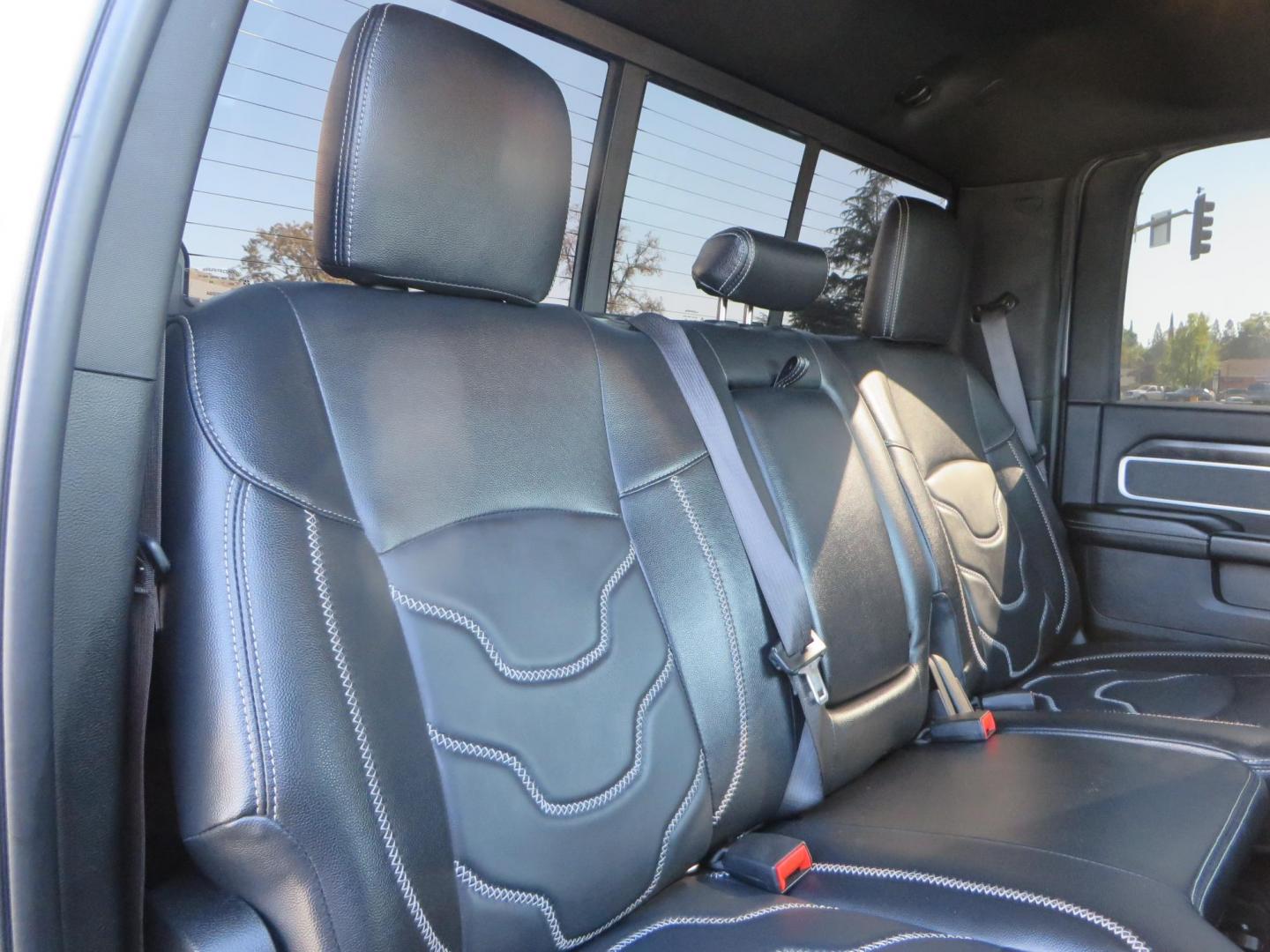 2022 SILVER /Black RAM 2500 Big Horn Black Widow Edition Crew Cab 4WD (3C6UR5DL3NG) with an 6.7L L6 OHV 24V TURBO DIESEL engine, 6A transmission, located at 2630 Grass Valley Highway, Auburn, CA, 95603, (530) 508-5100, 38.937893, -121.095482 - Ram 2500 Black Widow Edition Features 5" Suspension Lift System 20" Black Off Road Wheels 37" BFG KM3 Mud Terrain Tires Color Matched Pocket Fender Flares AMP Power Running Boards Tinted Front Windows Black Widow Gauge Cluster Black Widow Custom Stitched Headrests Red LED Interior Lights P - Photo#62