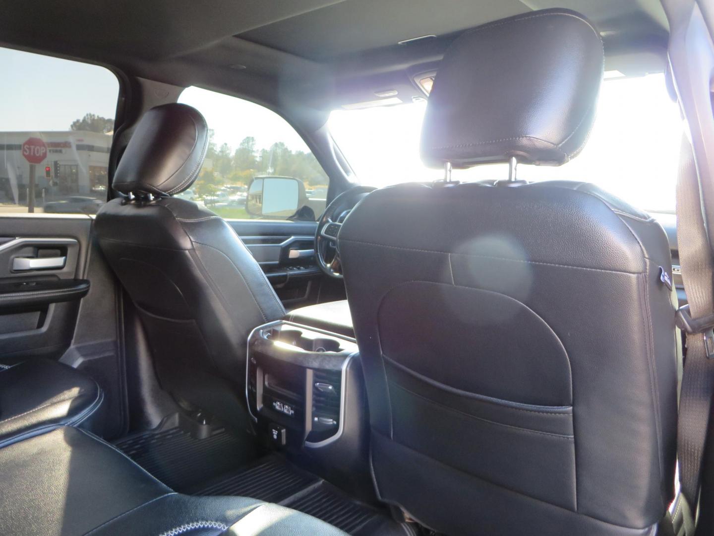 2022 SILVER /Black RAM 2500 Big Horn Black Widow Edition Crew Cab 4WD (3C6UR5DL3NG) with an 6.7L L6 OHV 24V TURBO DIESEL engine, 6A transmission, located at 2630 Grass Valley Highway, Auburn, CA, 95603, (530) 508-5100, 38.937893, -121.095482 - Ram 2500 Black Widow Edition Features 5" Suspension Lift System 20" Black Off Road Wheels 37" BFG KM3 Mud Terrain Tires Color Matched Pocket Fender Flares AMP Power Running Boards Tinted Front Windows Black Widow Gauge Cluster Black Widow Custom Stitched Headrests Red LED Interior Lights P - Photo#64