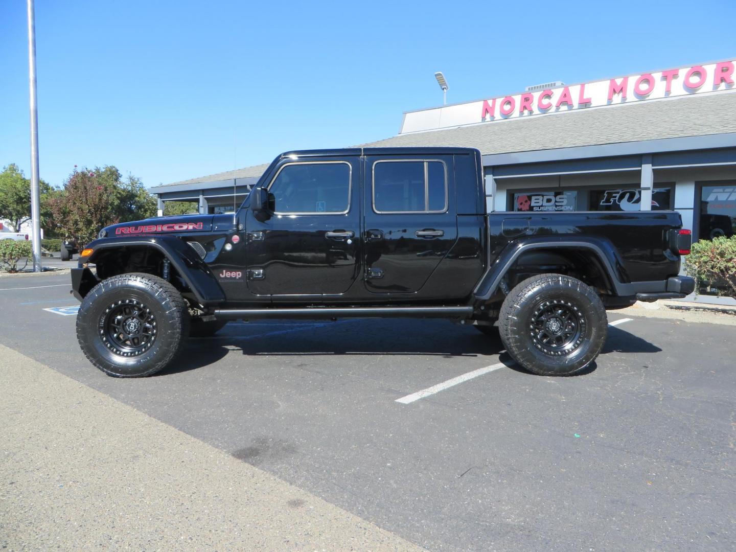 2021 BLACK /BLACK Jeep Gladiator Rubicon (1C6JJTBG1ML) with an 3.6L V6 DOHC 24V engine, automatic transmission, located at 2630 Grass Valley Highway, Auburn, CA, 95603, (530) 508-5100, 38.937893, -121.095482 - Mopar lifted Rubicon with Fox shocks, 17" Black Rhino Kelso wheels, 35" Nitto Terra Grappler G2 tires, AMP power steps, Rock Hard 4x4 front bumper, Warn Winch, 10" Rigid light bar, Bakflip MX4, and a Btech UV-5100 radio. - Photo#1