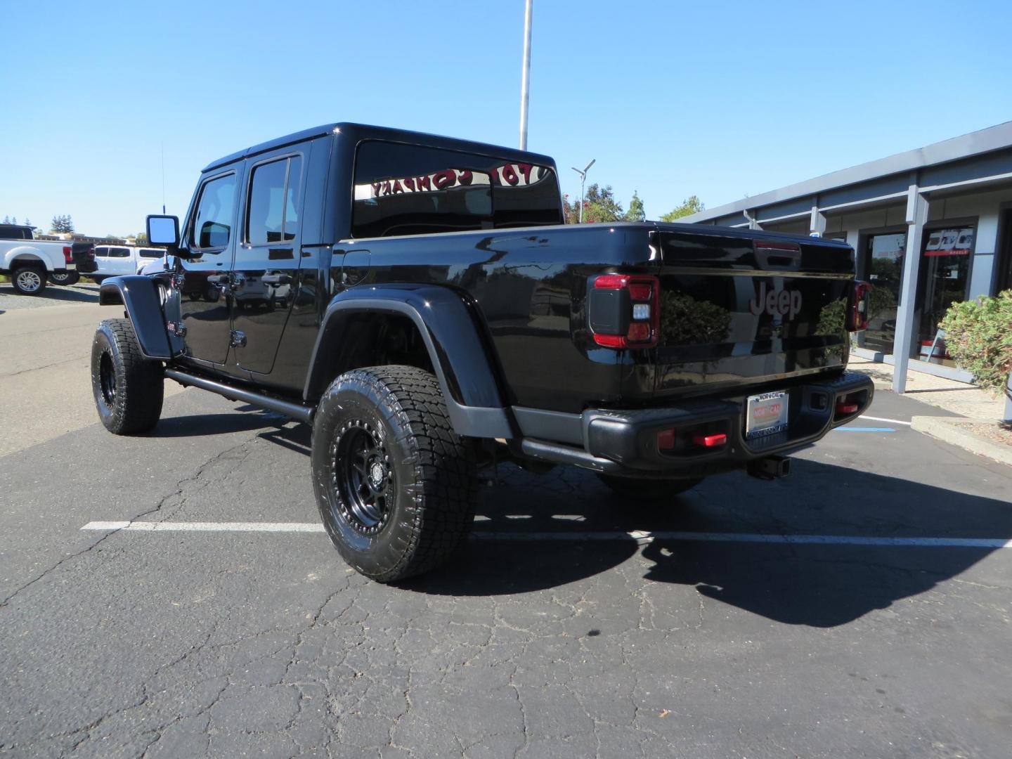 2021 BLACK /BLACK Jeep Gladiator Rubicon (1C6JJTBG1ML) with an 3.6L V6 DOHC 24V engine, automatic transmission, located at 2630 Grass Valley Highway, Auburn, CA, 95603, (530) 508-5100, 38.937893, -121.095482 - Mopar lifted Rubicon with Fox shocks, 17" Black Rhino Kelso wheels, 35" Nitto Terra Grappler G2 tires, AMP power steps, Rock Hard 4x4 front bumper, Warn Winch, 10" Rigid light bar, Bakflip MX4, and a Btech UV-5100 radio. - Photo#2