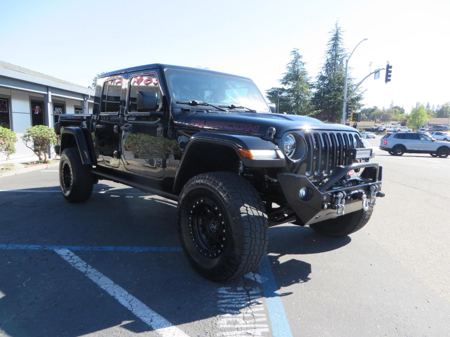 2021 BLACK /BLACK Jeep Gladiator Rubicon (1C6JJTBG1ML) with an 3.6L V6 DOHC 24V engine, automatic transmission, located at 2630 Grass Valley Highway, Auburn, CA, 95603, (530) 508-5100, 38.937893, -121.095482 - Mopar lifted Rubicon with Fox shocks, 17" Black Rhino Kelso wheels, 35" Nitto Terra Grappler G2 tires, AMP power steps, Rock Hard 4x4 front bumper, Warn Winch, 10" Rigid light bar, Bakflip MX4, and a Btech UV-5100 radio. - Photo#6