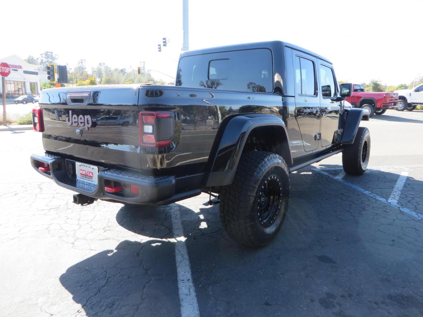 2021 BLACK /BLACK Jeep Gladiator Rubicon (1C6JJTBG1ML) with an 3.6L V6 DOHC 24V engine, automatic transmission, located at 2630 Grass Valley Highway, Auburn, CA, 95603, (530) 508-5100, 38.937893, -121.095482 - Mopar lifted Rubicon with Fox shocks, 17" Black Rhino Kelso wheels, 35" Nitto Terra Grappler G2 tires, AMP power steps, Rock Hard 4x4 front bumper, Warn Winch, 10" Rigid light bar, Bakflip MX4, and a Btech UV-5100 radio. - Photo#4
