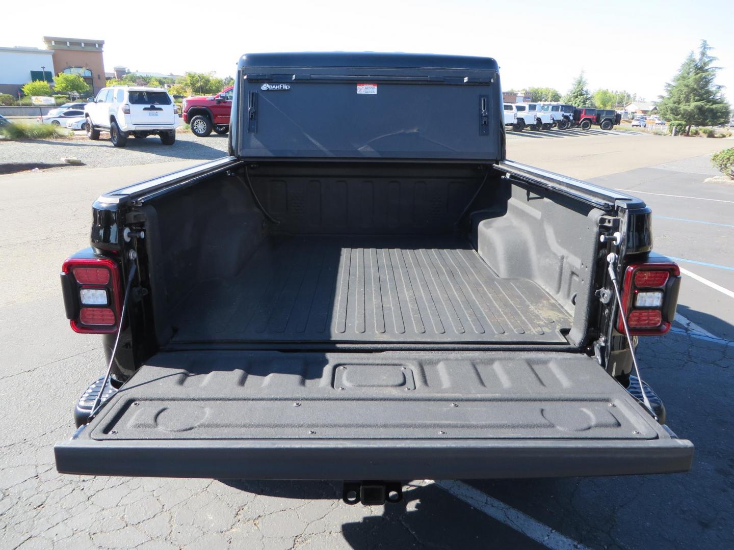 2021 BLACK /BLACK Jeep Gladiator Rubicon (1C6JJTBG1ML) with an 3.6L V6 DOHC 24V engine, automatic transmission, located at 2630 Grass Valley Highway, Auburn, CA, 95603, (530) 508-5100, 38.937893, -121.095482 - Mopar lifted Rubicon with Fox shocks, 17" Black Rhino Kelso wheels, 35" Nitto Terra Grappler G2 tires, AMP power steps, Rock Hard 4x4 front bumper, Warn Winch, 10" Rigid light bar, Bakflip MX4, and a Btech UV-5100 radio. - Photo#17