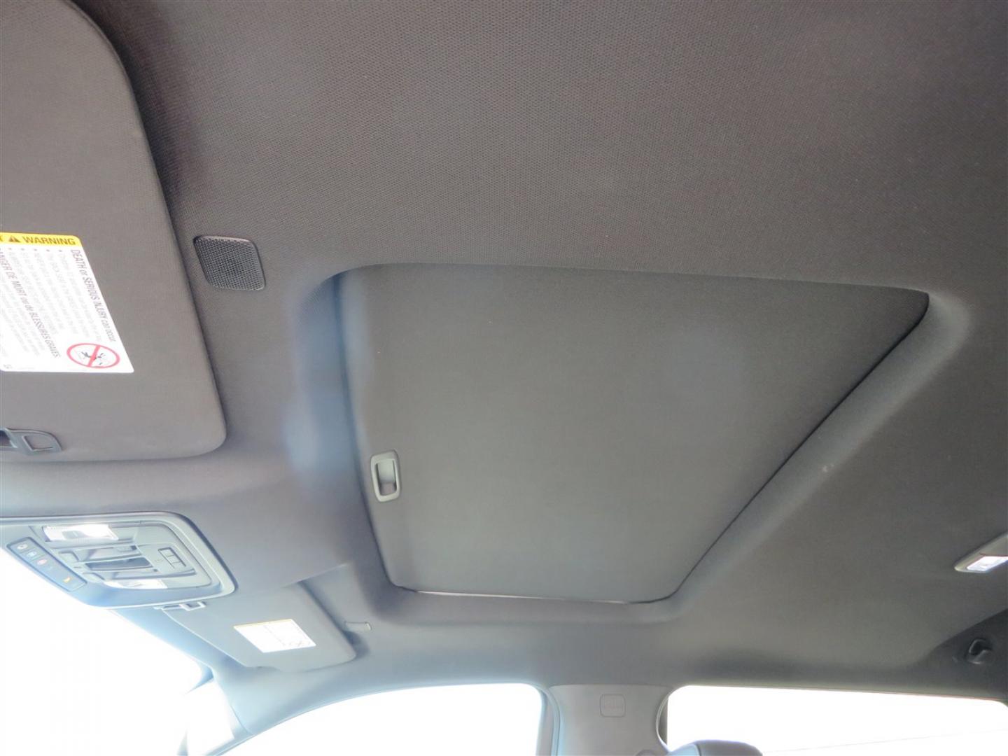 2021 BLACK /BLACK GMC Sierra 2500HD AT4 Crew Cab 4WD (1GT49PEY3MF) with an 6.6L V8 OHV 16 DIESEL engine, 6A transmission, located at 2630 Grass Valley Highway, Auburn, CA, 95603, (530) 508-5100, 38.937893, -121.095482 - Features a RC 7'' suspension system, 37'' Nitto Ridge Grappler tires, 22'' 4 Play wheels, Airlift helper bags with compressor, soft folding tonneau cover, and window tint. - Photo#28