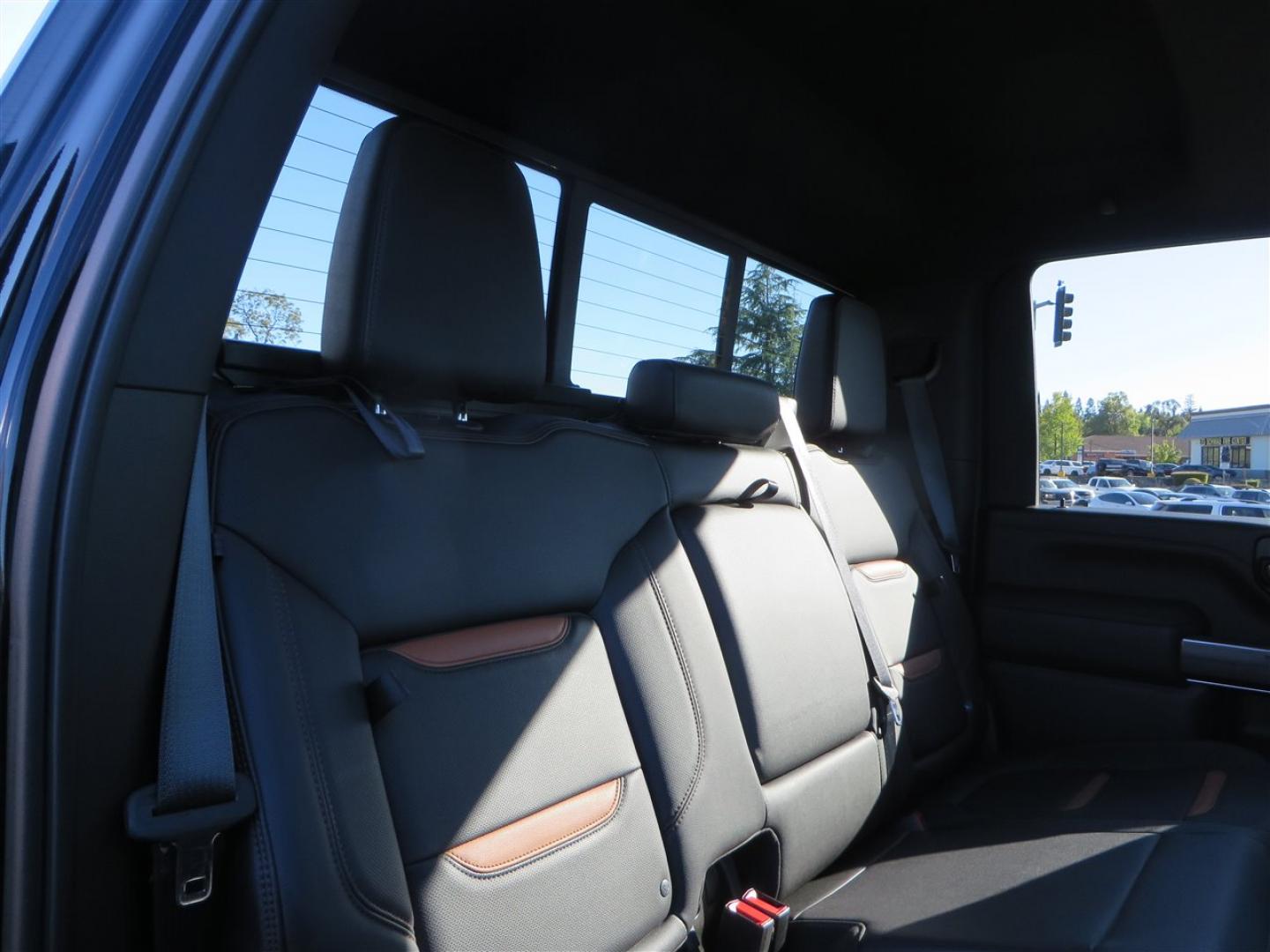 2021 BLACK /BLACK GMC Sierra 2500HD AT4 Crew Cab 4WD (1GT49PEY3MF) with an 6.6L V8 OHV 16 DIESEL engine, 6A transmission, located at 2630 Grass Valley Highway, Auburn, CA, 95603, (530) 508-5100, 38.937893, -121.095482 - Features a RC 7'' suspension system, 37'' Nitto Ridge Grappler tires, 22'' 4 Play wheels, Airlift helper bags with compressor, soft folding tonneau cover, and window tint. - Photo#65