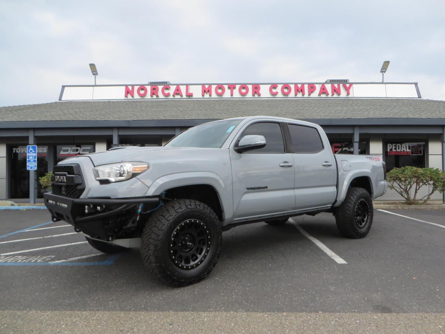 2019 grey /black Toyota Tacoma TRD Sport Double Cab (3TMCZ5AN2KM) with an 3.6L V6 DOHC 24V engine, 6A transmission, located at 2630 Grass Valley Highway, Auburn, CA, 95603, (530) 508-5100, 38.937893, -121.095482 - Must see Tacoma sitting on King 2.5 adjustable remote reservoir coilovers, King 2.5 adjustable remote reservoir rear shocks, Icon Upper control arms, BFG KO3 tires, 17" Method NV wheels, C4 front bumper, Baja Designs lights, LUXX series taillights, aluminum TRD skid plate, bedmat, bed extender, and - Photo#0