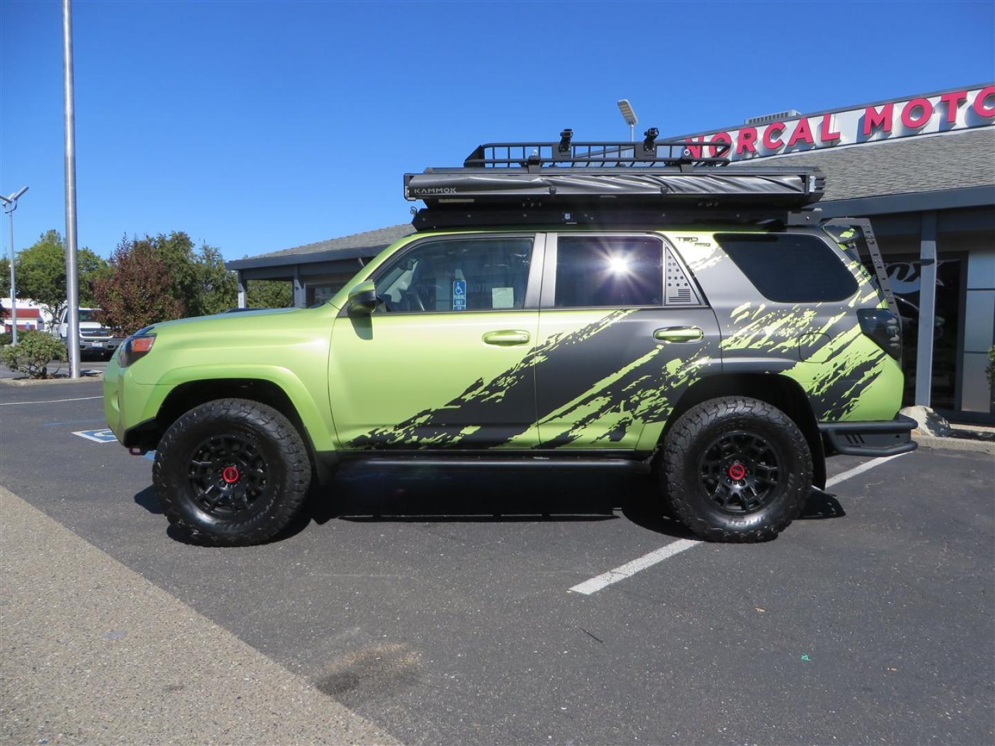 2022 Green /Black Toyota 4Runner TRD PRO 4WD (JTELU5JR6N6) with an 4.0L V6 DOHC 24V engine, 5A transmission, located at 2630 Grass Valley Highway, Auburn, CA, 95603, (530) 508-5100, 38.937893, -121.095482 - Features- A Magnuson Supercharger, Westcott Designs level kit and Roof Ladder, BFG KO3 tires, IronMan Front and rear bumpers, Winch, Led lighting, Rock Sliders, Alpha Rex tail lights, IKamper roof rack, Mamba Roof mounted tent, Yakima roof basket, Kammok Awning, Smoked bug deflector, Pedal Commander - Photo#1