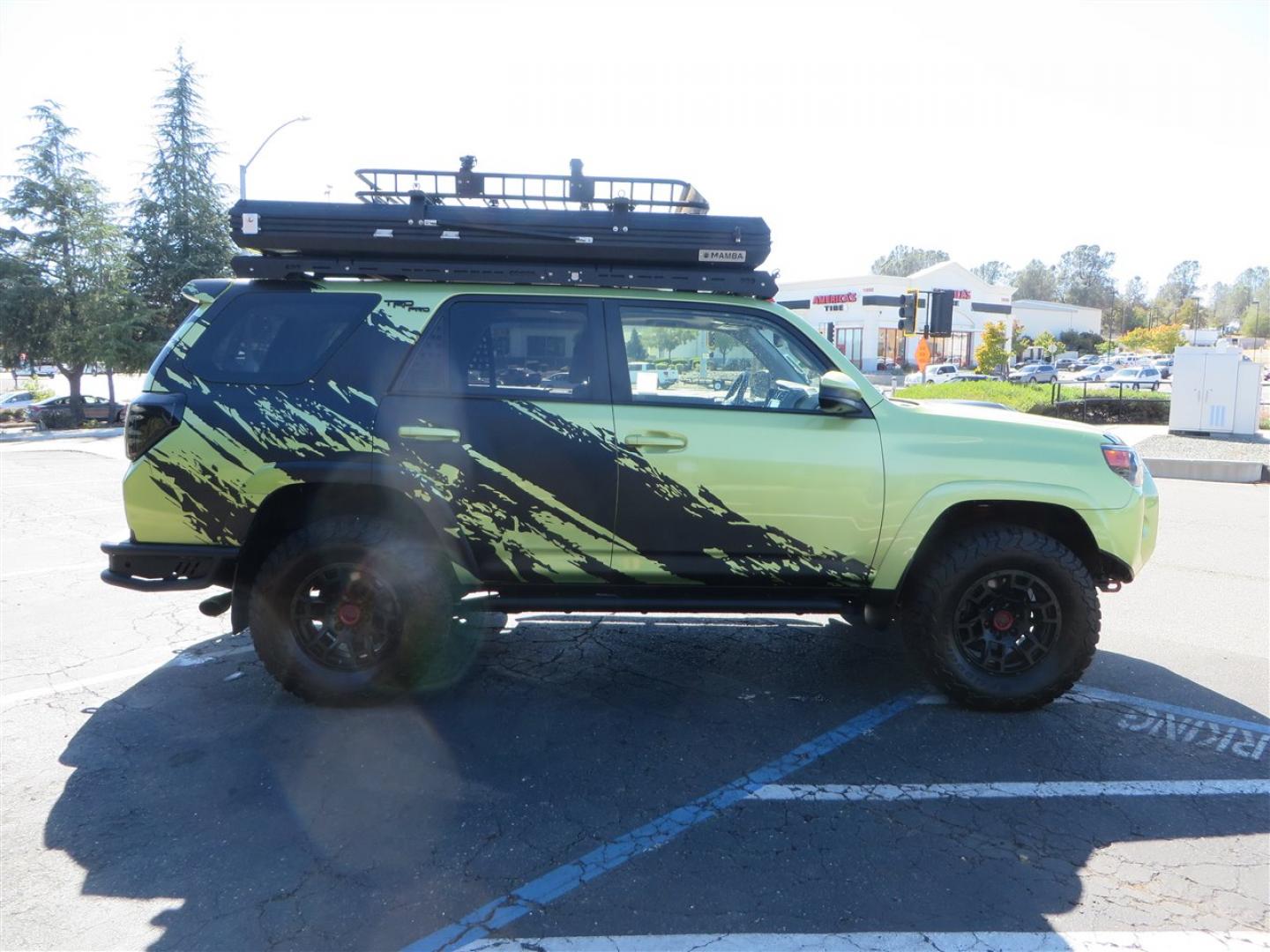 2022 Green /Black Toyota 4Runner TRD PRO 4WD (JTELU5JR6N6) with an 4.0L V6 DOHC 24V engine, 5A transmission, located at 2630 Grass Valley Highway, Auburn, CA, 95603, (530) 508-5100, 38.937893, -121.095482 - Features- A Magnuson Supercharger, Westcott Designs level kit and Roof Ladder, BFG KO3 tires, IronMan Front and rear bumpers, Winch, Led lighting, Rock Sliders, Alpha Rex tail lights, IKamper roof rack, Mamba Roof mounted tent, Yakima roof basket, Kammok Awning, Smoked bug deflector, Pedal Commander - Photo#5