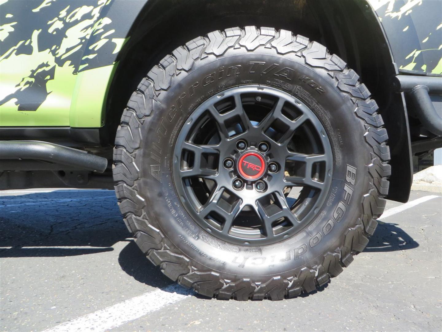 2022 Green /Black Toyota 4Runner TRD PRO 4WD (JTELU5JR6N6) with an 4.0L V6 DOHC 24V engine, 5A transmission, located at 2630 Grass Valley Highway, Auburn, CA, 95603, (530) 508-5100, 38.937893, -121.095482 - Features- A Magnuson Supercharger, Westcott Designs level kit and Roof Ladder, BFG KO3 tires, IronMan Front and rear bumpers, Winch, Led lighting, Rock Sliders, Alpha Rex tail lights, IKamper roof rack, Mamba Roof mounted tent, Yakima roof basket, Kammok Awning, Smoked bug deflector, Pedal Commander - Photo#8