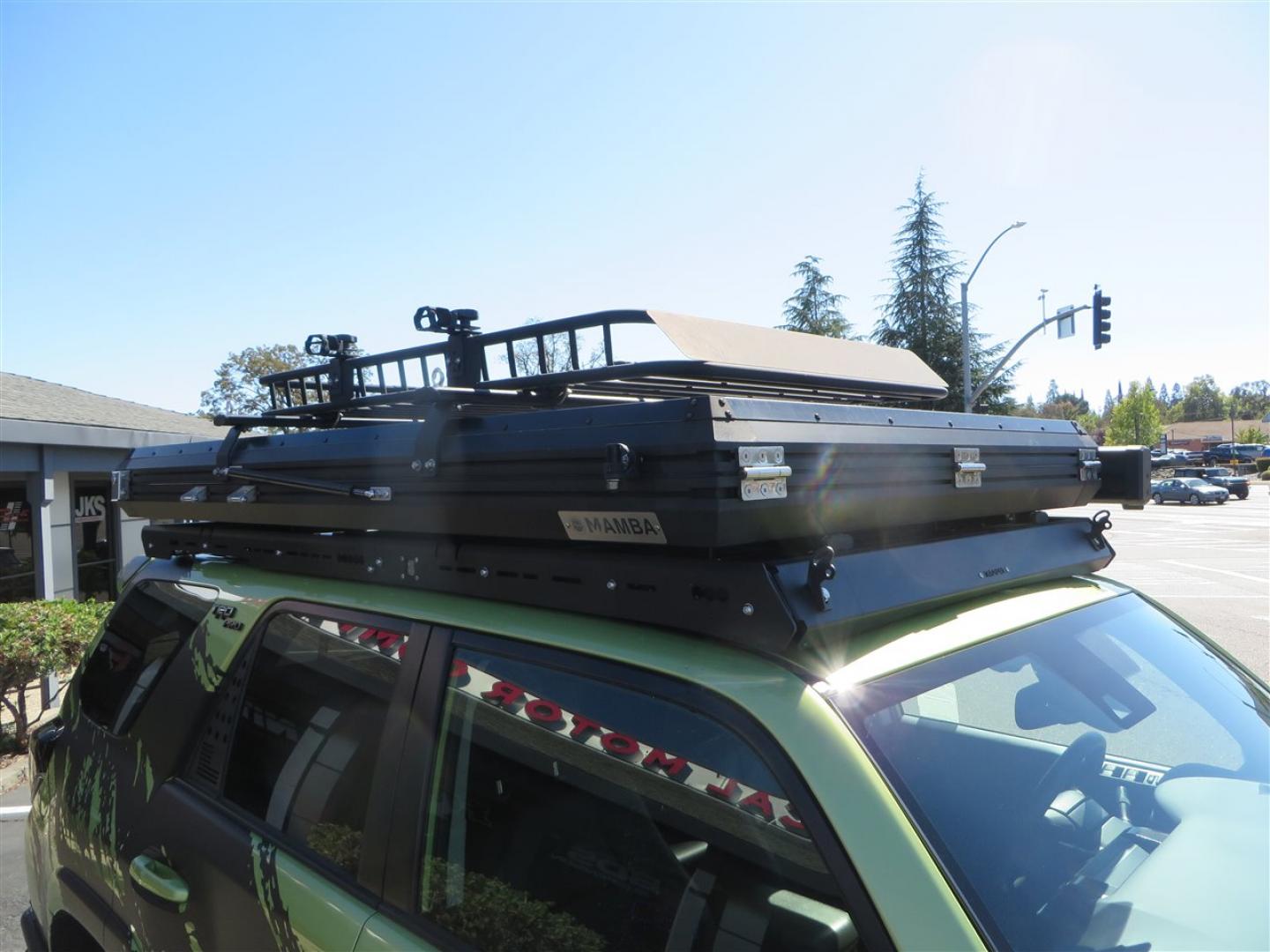 2022 Green /Black Toyota 4Runner TRD PRO 4WD (JTELU5JR6N6) with an 4.0L V6 DOHC 24V engine, 5A transmission, located at 2630 Grass Valley Highway, Auburn, CA, 95603, (530) 508-5100, 38.937893, -121.095482 - Features- A Magnuson Supercharger, Westcott Designs level kit and Roof Ladder, BFG KO3 tires, IronMan Front and rear bumpers, Winch, Led lighting, Rock Sliders, Alpha Rex tail lights, IKamper roof rack, Mamba Roof mounted tent, Yakima roof basket, Kammok Awning, Smoked bug deflector, Pedal Commander - Photo#25