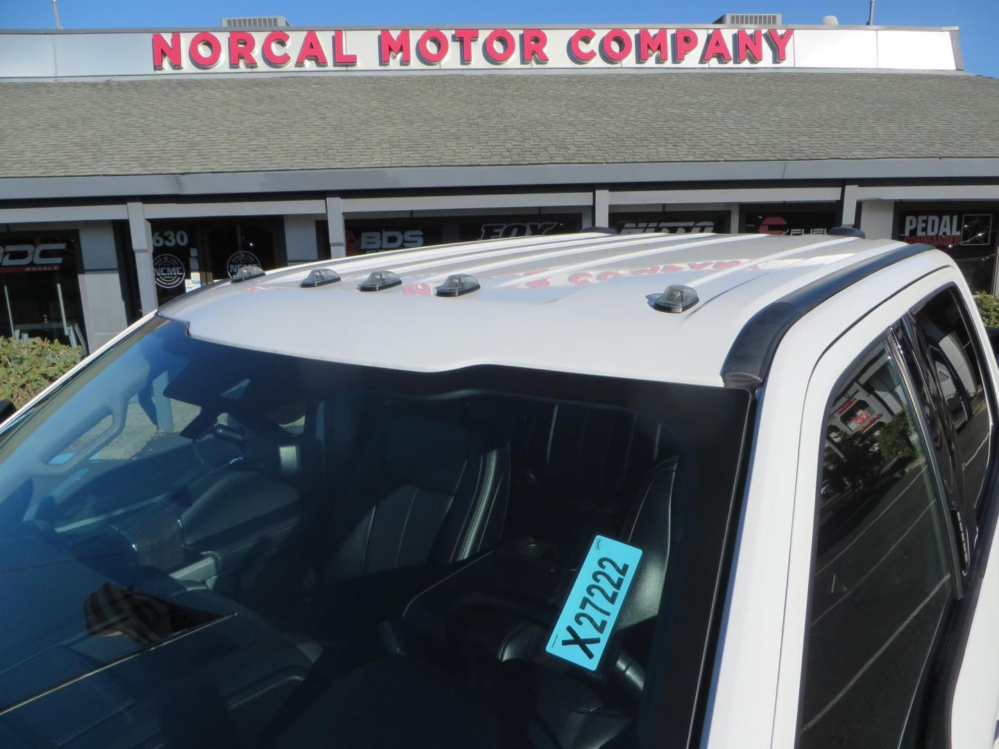 2021 White /BLACK Ford F-250 SD Lariat Crew Cab 4WD (1FT7W2BTXME) with an 6.7L V8 OHV 16V DIESEL engine, 6A transmission, located at 2630 Grass Valley Highway, Auburn, CA, 95603, (530) 508-5100, 38.937893, -121.095482 - Features a BDS level kit with Fox 2.0 shocks, 35" Toyo Open Country RT trail tires, 18" KMC IMS wheels, Weathertech Bug deflector and floor liners. - Photo#14