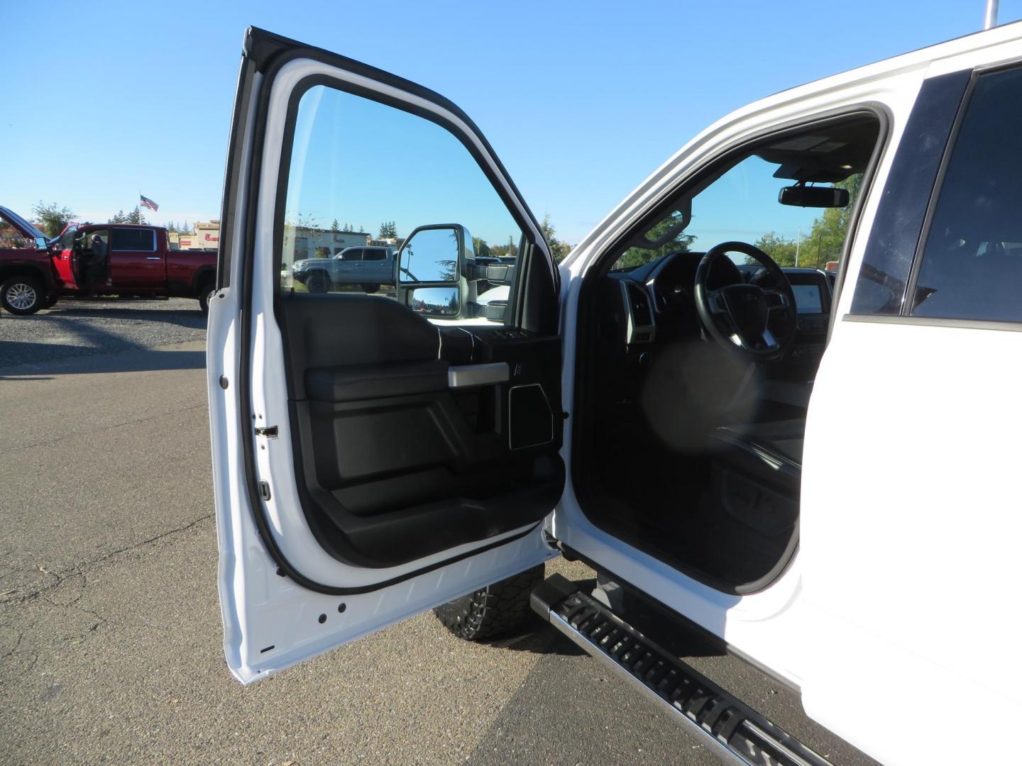 2021 White /BLACK Ford F-250 SD Lariat Crew Cab 4WD (1FT7W2BTXME) with an 6.7L V8 OHV 16V DIESEL engine, 6A transmission, located at 2630 Grass Valley Highway, Auburn, CA, 95603, (530) 508-5100, 38.937893, -121.095482 - Features a BDS level kit with Fox 2.0 shocks, 35" Toyo Open Country RT trail tires, 18" KMC IMS wheels, Weathertech Bug deflector and floor liners. - Photo#17