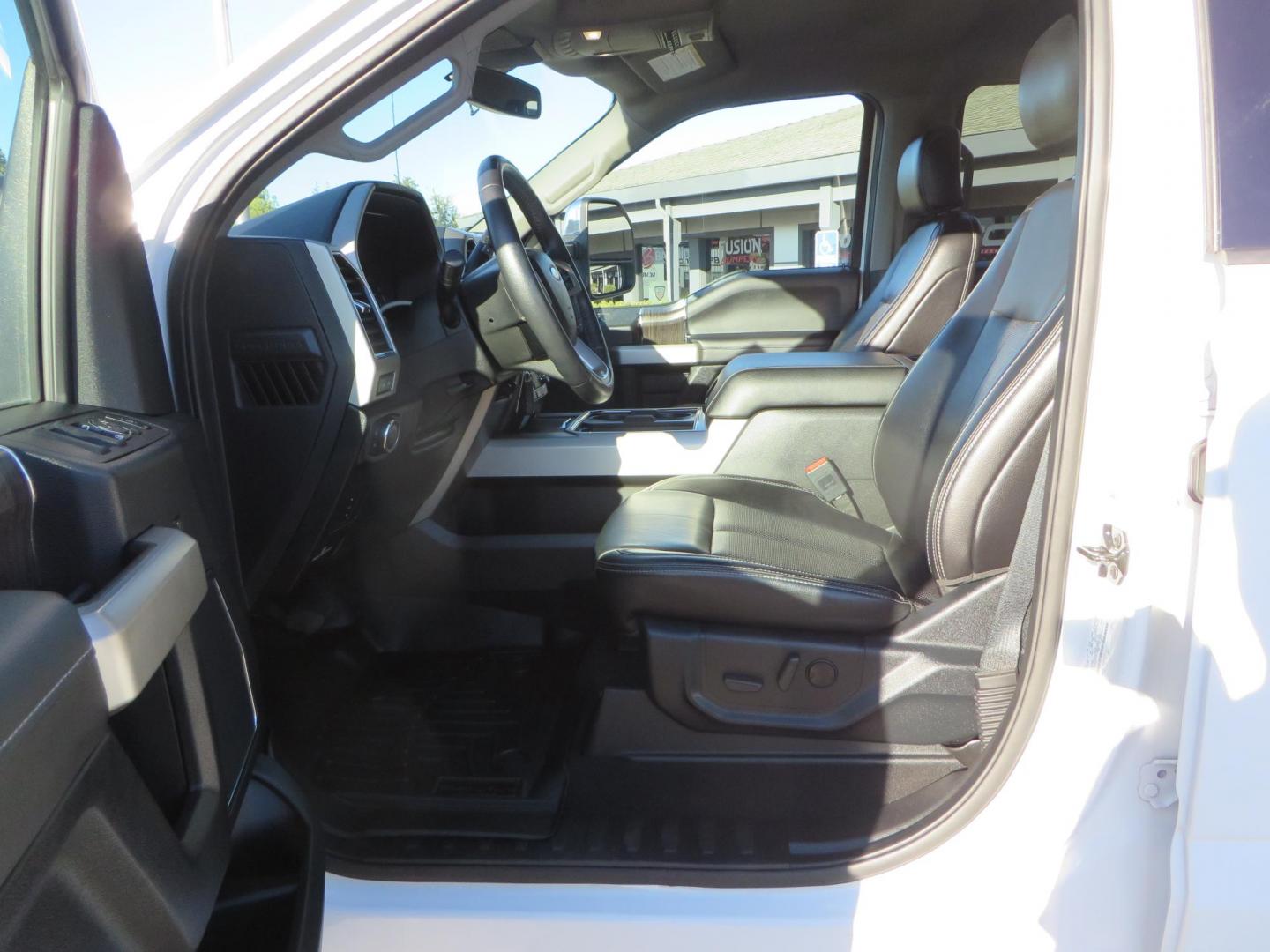 2021 White /BLACK Ford F-250 SD Lariat Crew Cab 4WD (1FT7W2BTXME) with an 6.7L V8 OHV 16V DIESEL engine, 6A transmission, located at 2630 Grass Valley Highway, Auburn, CA, 95603, (530) 508-5100, 38.937893, -121.095482 - Features a BDS level kit with Fox 2.0 shocks, 35" Toyo Open Country RT trail tires, 18" KMC IMS wheels, Weathertech Bug deflector and floor liners. - Photo#20