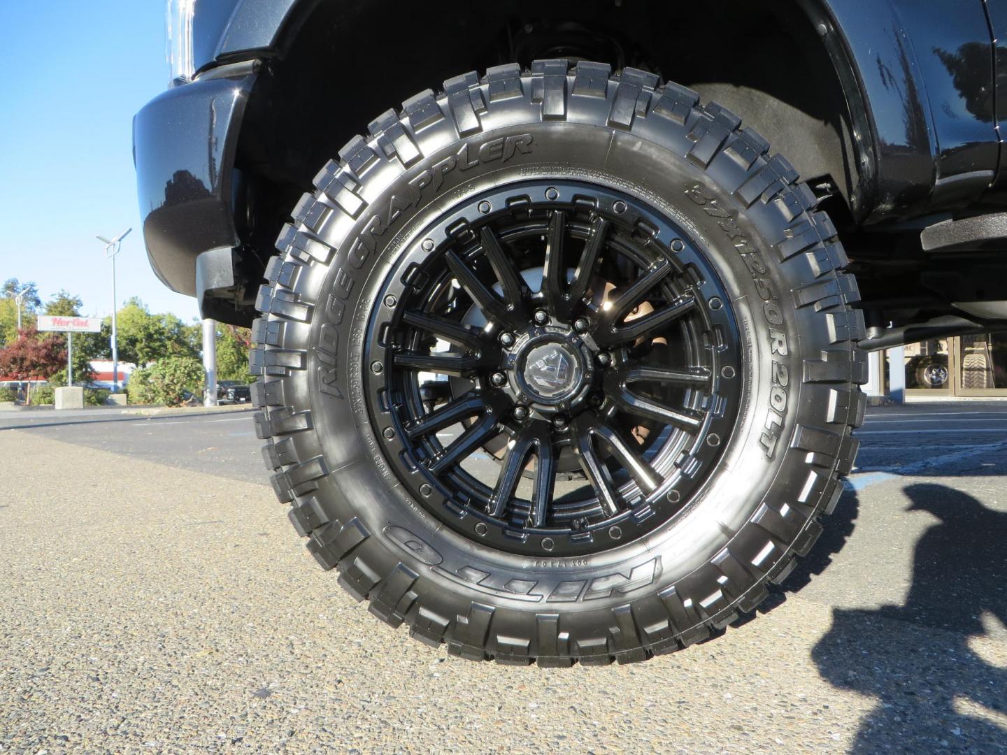 2022 BLACK /BLACK Ford F-250 SD Platinum Tremor Crew Cab Short Bed 4WD (1FT8W2BT2NE) with an 6.7L V8 OHV 16V DIESEL engine, 10 speed transmission, located at 2630 Grass Valley Highway, Auburn, CA, 95603, (530) 508-5100, 38.937893, -121.095482 - Features - BDS 4" Radius arm suspension system, Fox 2.0 shocks, Dual Fox steering stabilizers, 37" Nitto Ridge Grappler tires, 20" Fuel Rebel wheels, Airlift air bags, Airlift wireless 1 compressor, and window tint. - Photo#9