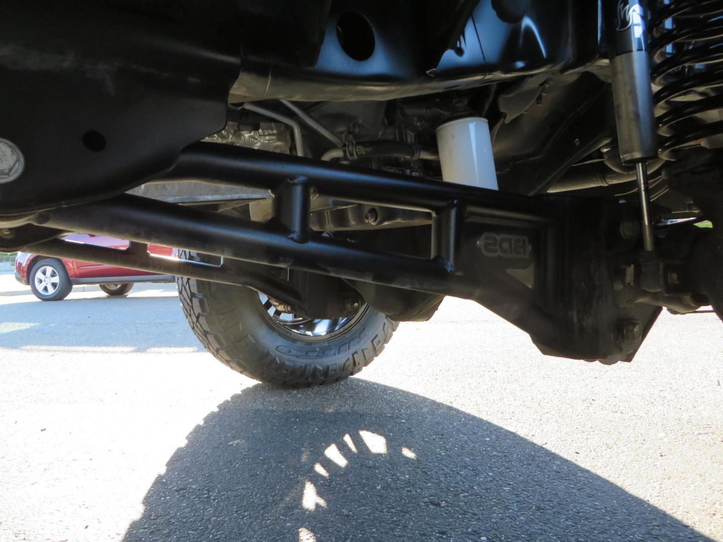 2022 BLACK /BLACK Ford F-250 SD Platinum Tremor Crew Cab Short Bed 4WD (1FT8W2BT2NE) with an 6.7L V8 OHV 16V DIESEL engine, 10 speed transmission, located at 2630 Grass Valley Highway, Auburn, CA, 95603, (530) 508-5100, 38.937893, -121.095482 - Features - BDS 4" Radius arm suspension system, Fox 2.0 shocks, Dual Fox steering stabilizers, 37" Nitto Ridge Grappler tires, 20" Fuel Rebel wheels, Airlift air bags, Airlift wireless 1 compressor, and window tint. - Photo#12