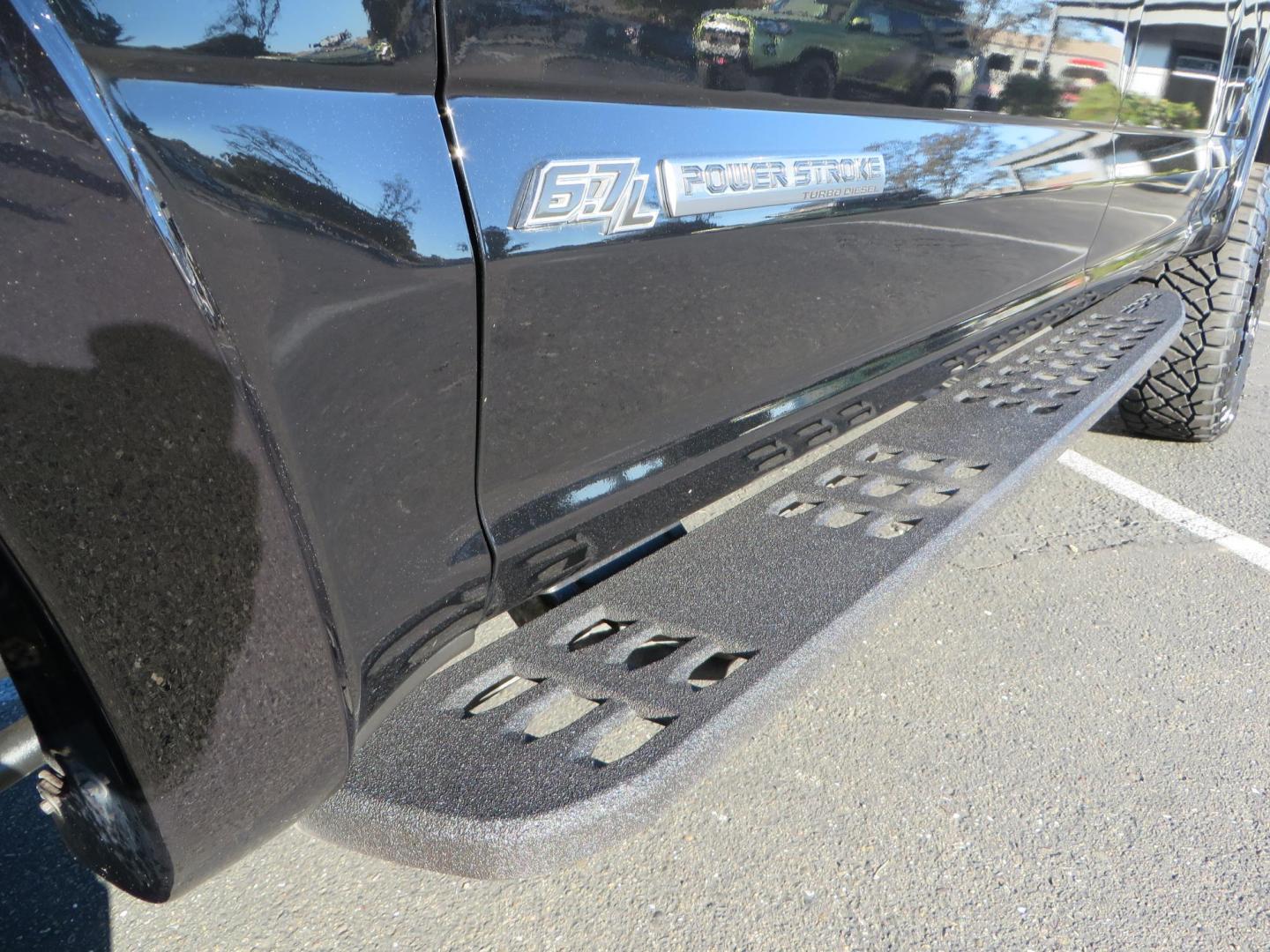 2022 BLACK /BLACK Ford F-250 SD Platinum Tremor Crew Cab Short Bed 4WD (1FT8W2BT2NE) with an 6.7L V8 OHV 16V DIESEL engine, 10 speed transmission, located at 2630 Grass Valley Highway, Auburn, CA, 95603, (530) 508-5100, 38.937893, -121.095482 - Features - BDS 4" Radius arm suspension system, Fox 2.0 shocks, Dual Fox steering stabilizers, 37" Nitto Ridge Grappler tires, 20" Fuel Rebel wheels, Airlift air bags, Airlift wireless 1 compressor, and window tint. - Photo#14