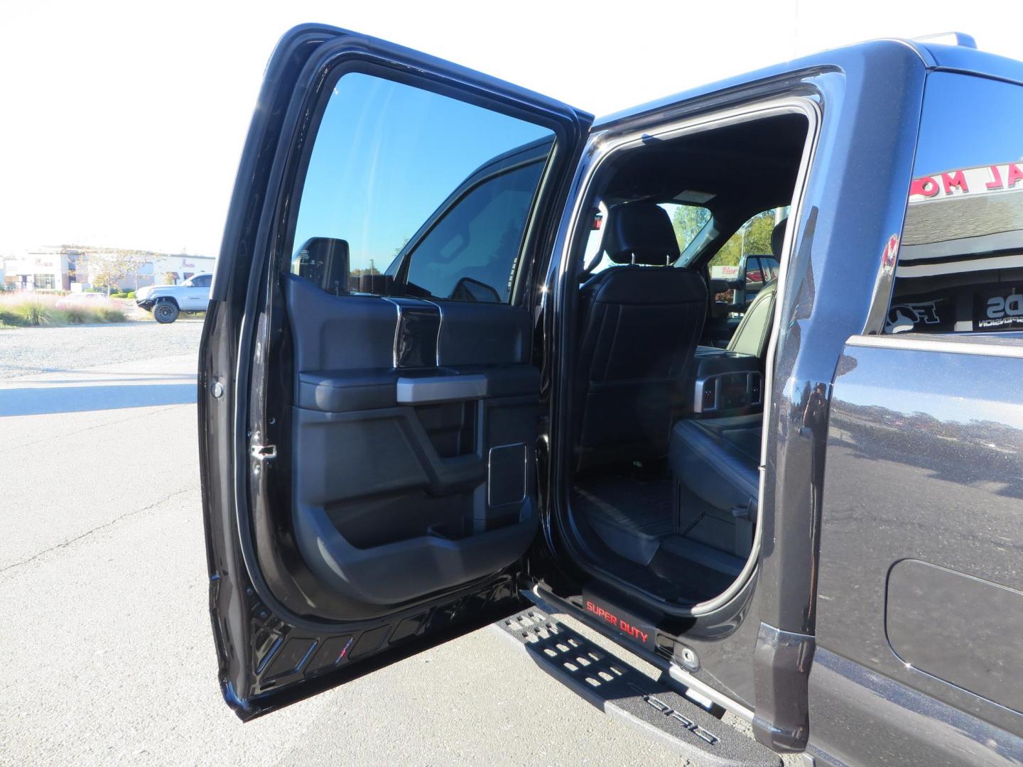2022 BLACK /BLACK Ford F-250 SD Platinum Tremor Crew Cab Short Bed 4WD (1FT8W2BT2NE) with an 6.7L V8 OHV 16V DIESEL engine, 10 speed transmission, located at 2630 Grass Valley Highway, Auburn, CA, 95603, (530) 508-5100, 38.937893, -121.095482 - Features - BDS 4" Radius arm suspension system, Fox 2.0 shocks, Dual Fox steering stabilizers, 37" Nitto Ridge Grappler tires, 20" Fuel Rebel wheels, Airlift air bags, Airlift wireless 1 compressor, and window tint. - Photo#52