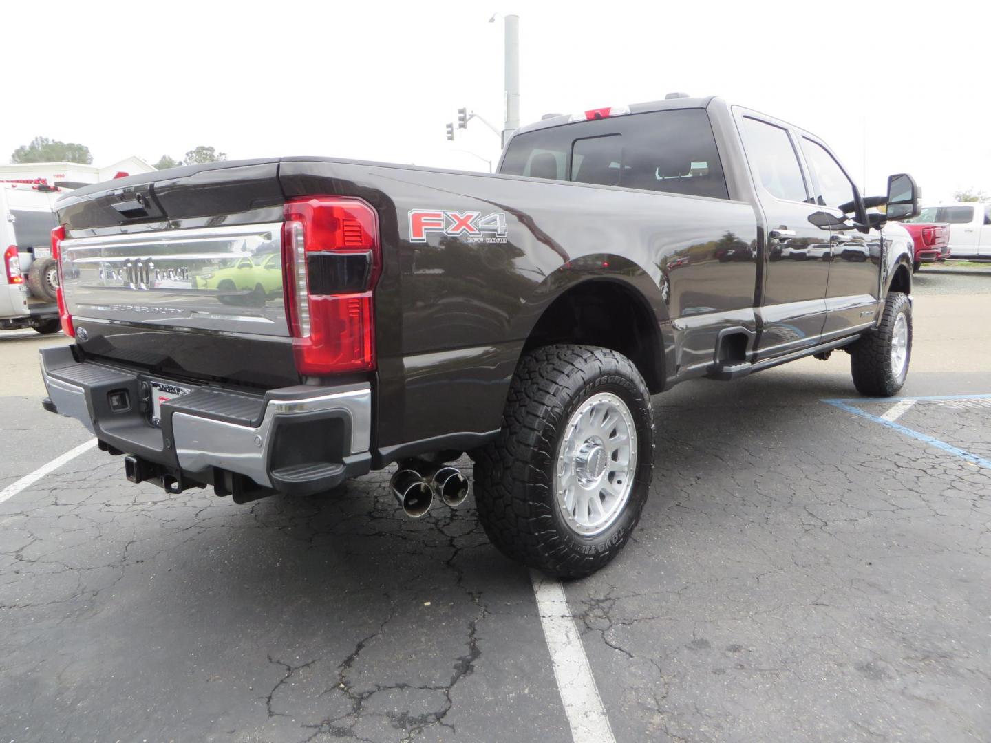 2024 Bronze /Brown Ford F-350 SD King Ranch Crew Cab Long Bed 4WD (1FT8W3BT4RE) with an 6.7L V8 OHV 16V DIESEL engine, 6A transmission, located at 2630 Grass Valley Highway, Auburn, CA, 95603, (530) 508-5100, 38.937893, -121.095482 - Longbed Kinch Ranch sitting on a BDS level kit, Fox 2.0 shocks, 20'' Method MR709 race wheels, and 35'' Toyo AT3 tires. - Photo#4