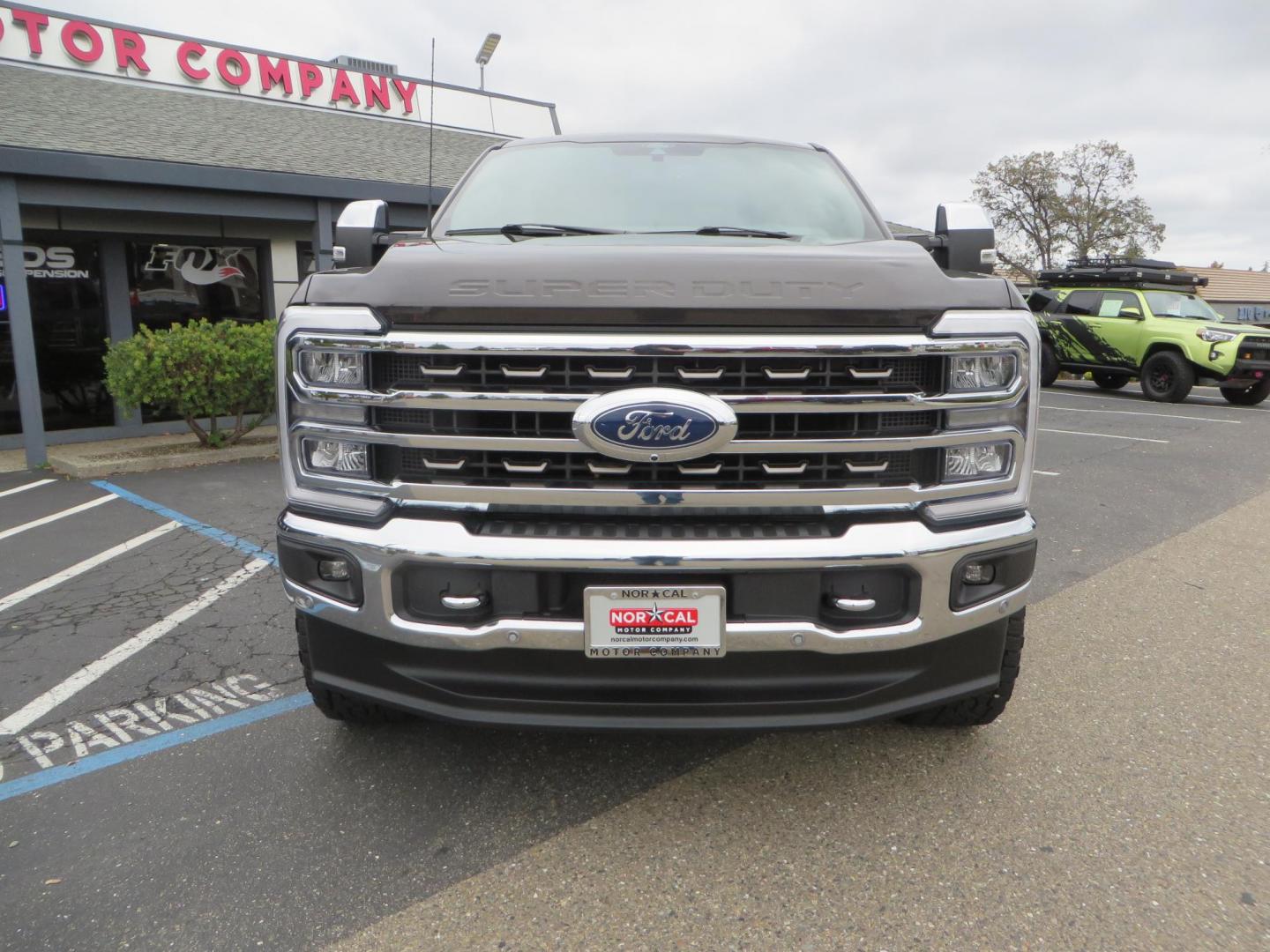 2024 Bronze /Brown Ford F-350 SD King Ranch Crew Cab Long Bed 4WD (1FT8W3BT4RE) with an 6.7L V8 OHV 16V DIESEL engine, 6A transmission, located at 2630 Grass Valley Highway, Auburn, CA, 95603, (530) 508-5100, 38.937893, -121.095482 - Longbed Kinch Ranch sitting on a BDS level kit, Fox 2.0 shocks, 20'' Method MR709 race wheels, and 35'' Toyo AT3 tires. - Photo#7