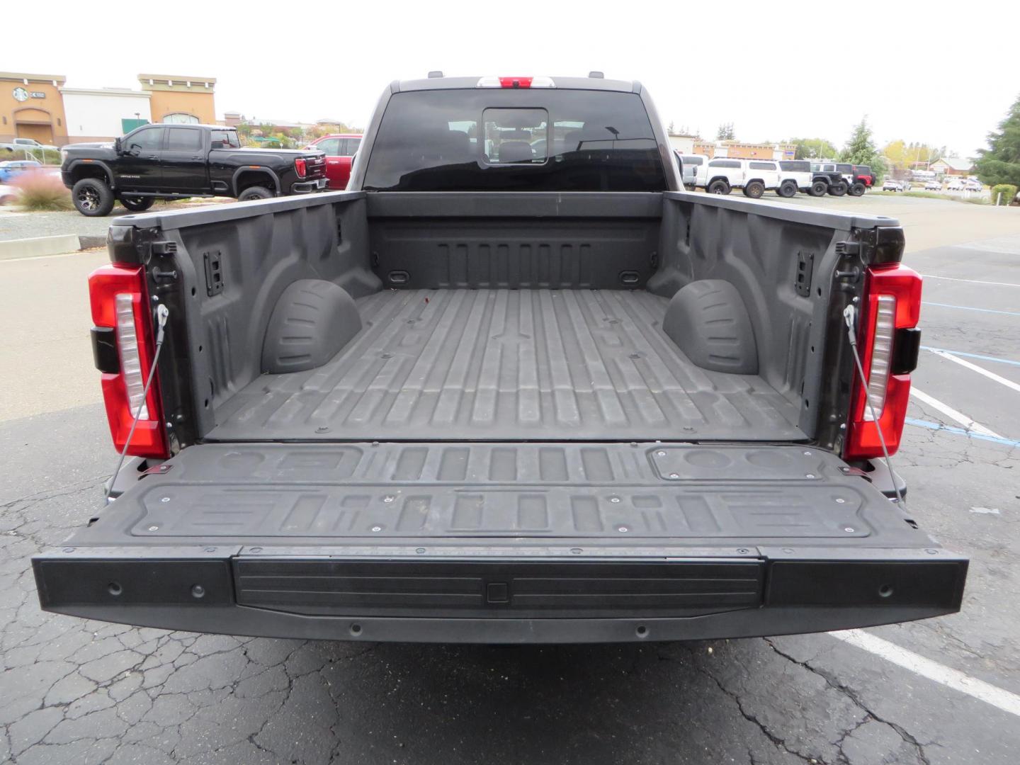 2024 Bronze /Brown Ford F-350 SD King Ranch Crew Cab Long Bed 4WD (1FT8W3BT4RE) with an 6.7L V8 OHV 16V DIESEL engine, 6A transmission, located at 2630 Grass Valley Highway, Auburn, CA, 95603, (530) 508-5100, 38.937893, -121.095482 - Longbed Kinch Ranch sitting on a BDS level kit, Fox 2.0 shocks, 20'' Method MR709 race wheels, and 35'' Toyo AT3 tires. - Photo#15