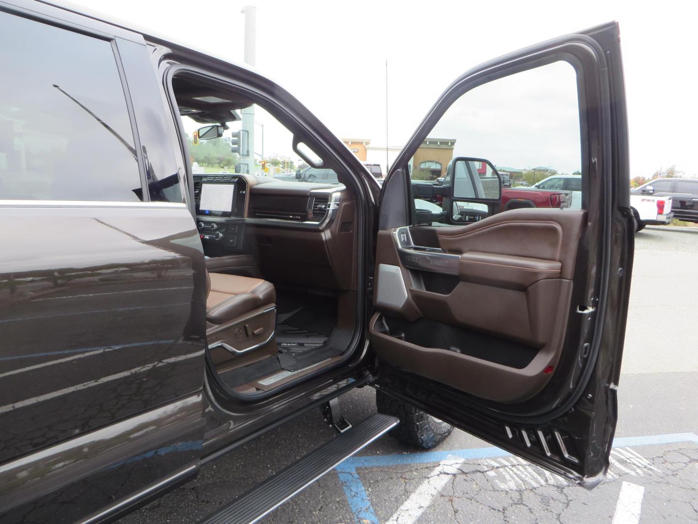 2024 Bronze /Brown Ford F-350 SD King Ranch Crew Cab Long Bed 4WD (1FT8W3BT4RE) with an 6.7L V8 OHV 16V DIESEL engine, 6A transmission, located at 2630 Grass Valley Highway, Auburn, CA, 95603, (530) 508-5100, 38.937893, -121.095482 - Longbed Kinch Ranch sitting on a BDS level kit, Fox 2.0 shocks, 20'' Method MR709 race wheels, and 35'' Toyo AT3 tires. - Photo#61