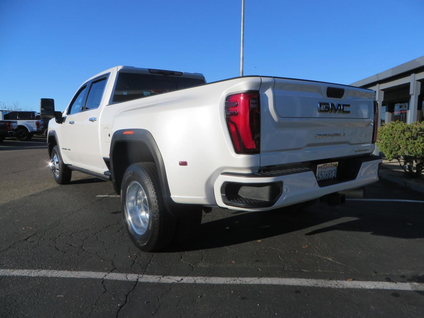 2024 White /Brown GMC Sierra 3500HD Crew Cab 4WD (1GT49YEYXRF) with an 6.6L V8 OHV 16V TURBO DIESEL engine, 10 Speed Automatic transmission, located at 2630 Grass Valley Highway, Auburn, CA, 95603, (530) 508-5100, 38.937893, -121.095482 - Must see Tow rig! - Photo#2