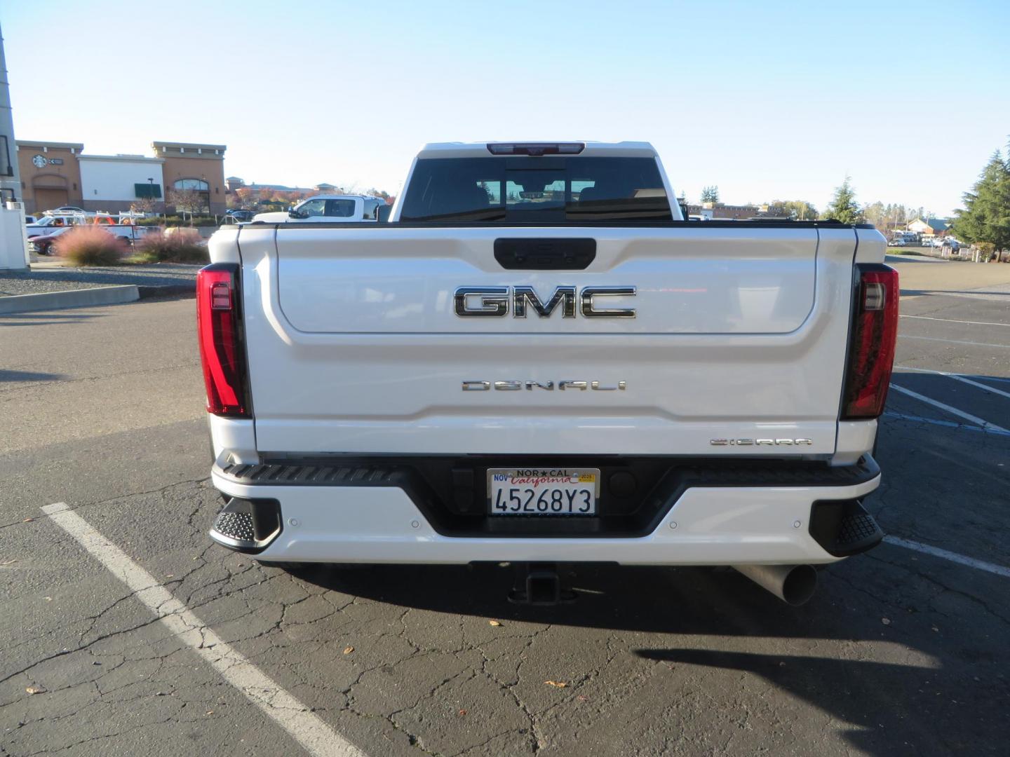 2024 White /Brown GMC Sierra 3500HD Crew Cab 4WD (1GT49YEYXRF) with an 6.6L V8 OHV 16V TURBO DIESEL engine, 10 Speed Automatic transmission, located at 2630 Grass Valley Highway, Auburn, CA, 95603, (530) 508-5100, 38.937893, -121.095482 - Must see Tow rig! - Photo#3